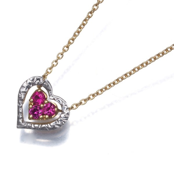 Star Jewelry Necklace Ruby in 18K Yellow White Gold: Star Jewelry Necklace Ruby in 18K Yellow White Gold STAR JEWELRY necklace featuring a natural ruby, crafted from 18k multi-tone gold, originating from Japan. Item Specifics: Country Of Origin: Japan B