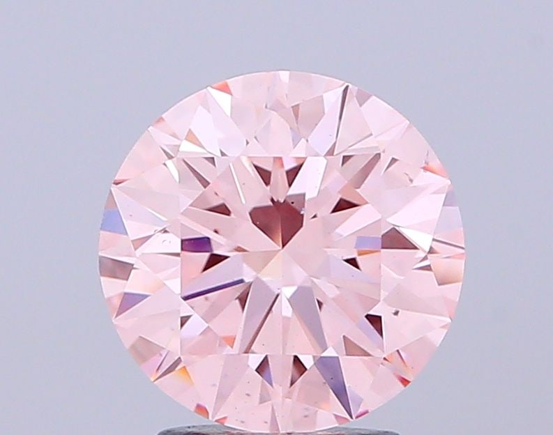 Ideal Loose Lab Diamond IGI Round 2.17ct Fancy Intense Pink VS2: Ideal Loose Lab Diamond IGI Round 2.17ct Fancy Intense Pink VS2 This Ideal Loose Lab Diamond is a 2.17ct round diamond with a fancy intense pink color and VS2 clarity, certified by IGI, with