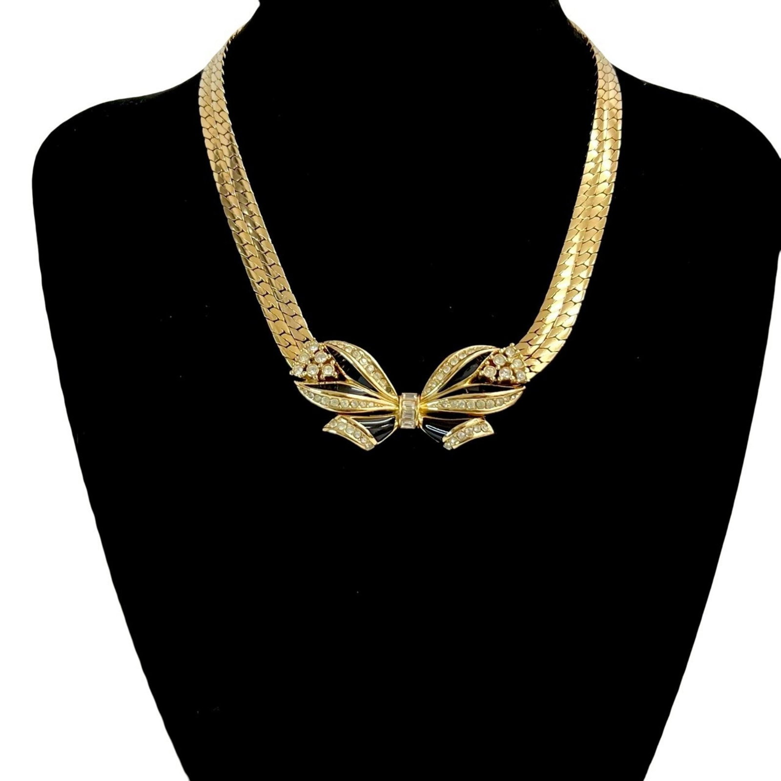 1190h Christian Dior Ribbon Motif Rhinestone GP Choker Necklace Gold: 1190h Christian Dior Ribbon Motif Rhinestone GP Choker Necklace Gold This listing features 1190h Christian Dior Ribbon Motif Rhinestone GP Choker Necklace Gold. Item specifics are provided below. Item