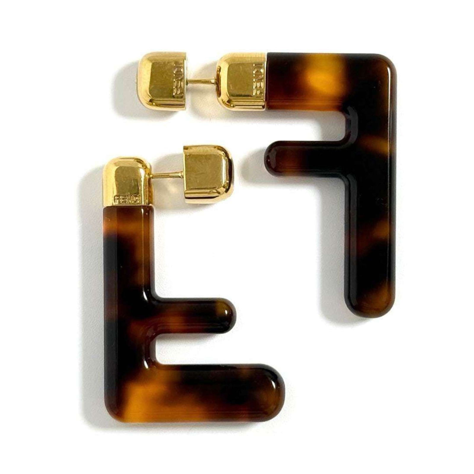 Resin - Fendi Stud Earrings Metal: Resin - Fendi Stud Earrings Metal This listing features Resin - Fendi Stud Earrings Metal. Item specifics are provided below. Item Specifics: Brand: Fendi Type: Stud Earrings Gender: Women Material: