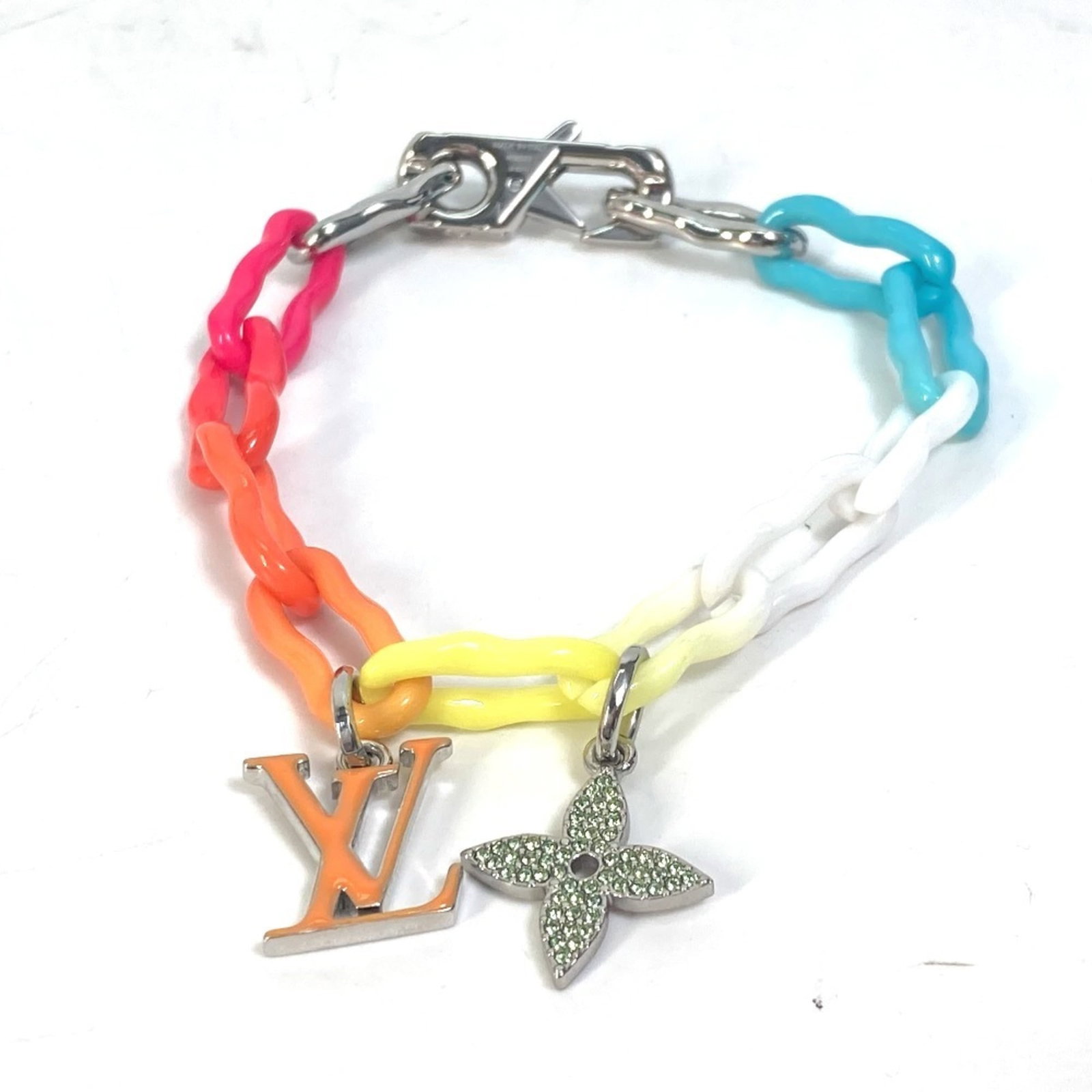 Metal Charm Bracelet by Louis Vuitton: Metal Charm Bracelet by Louis Vuitton This listing features Metal Charm Bracelet by Louis Vuitton. Item specifics are provided below. Item Specifics: Brand: Louis Vuitton Type: Charm Bracelet Gender: