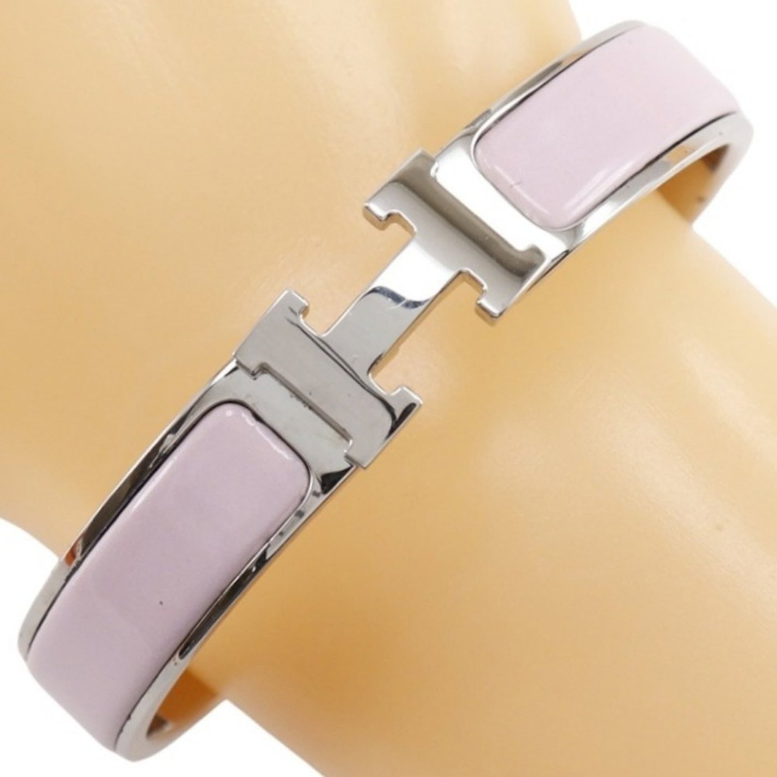 Hermes Metal Bangle: Hermes Metal Bangle This listing features Hermes Metal Bangle. Item specifics are provided below. Item Specifics: Brand: Hermes Type: Bangle Gender: Women Material: Metal Color: Pink, Silver Length: 1