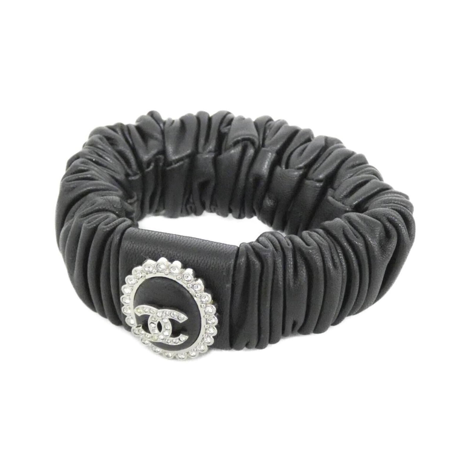 Leather Chanel Scrunchie: Leather Chanel Scrunchie This listing features Leather Chanel Scrunchie. Item specifics are provided below. Item Specifics: Brand: Chanel Type: Scrunchie Gender: Women Color: Black, Silver Material: L