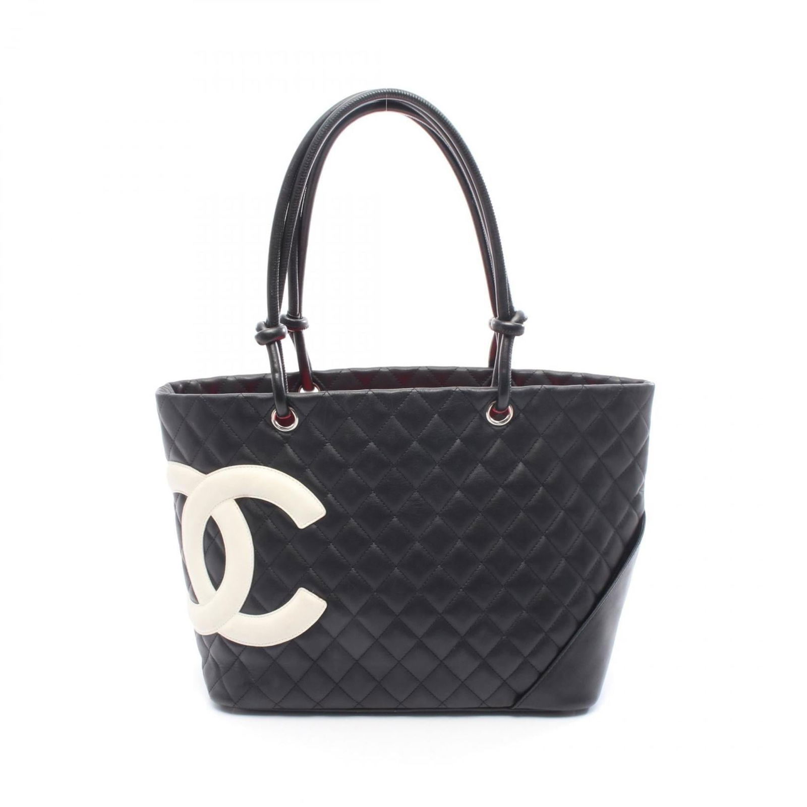Leather Chanel Tote Bag: Leather Chanel Tote Bag This listing features Leather Chanel Tote Bag. Item specifics are provided below. Item Specifics: Brand: Chanel Type: Tote Bag Material: Leather Color: Black, White Hardware Co