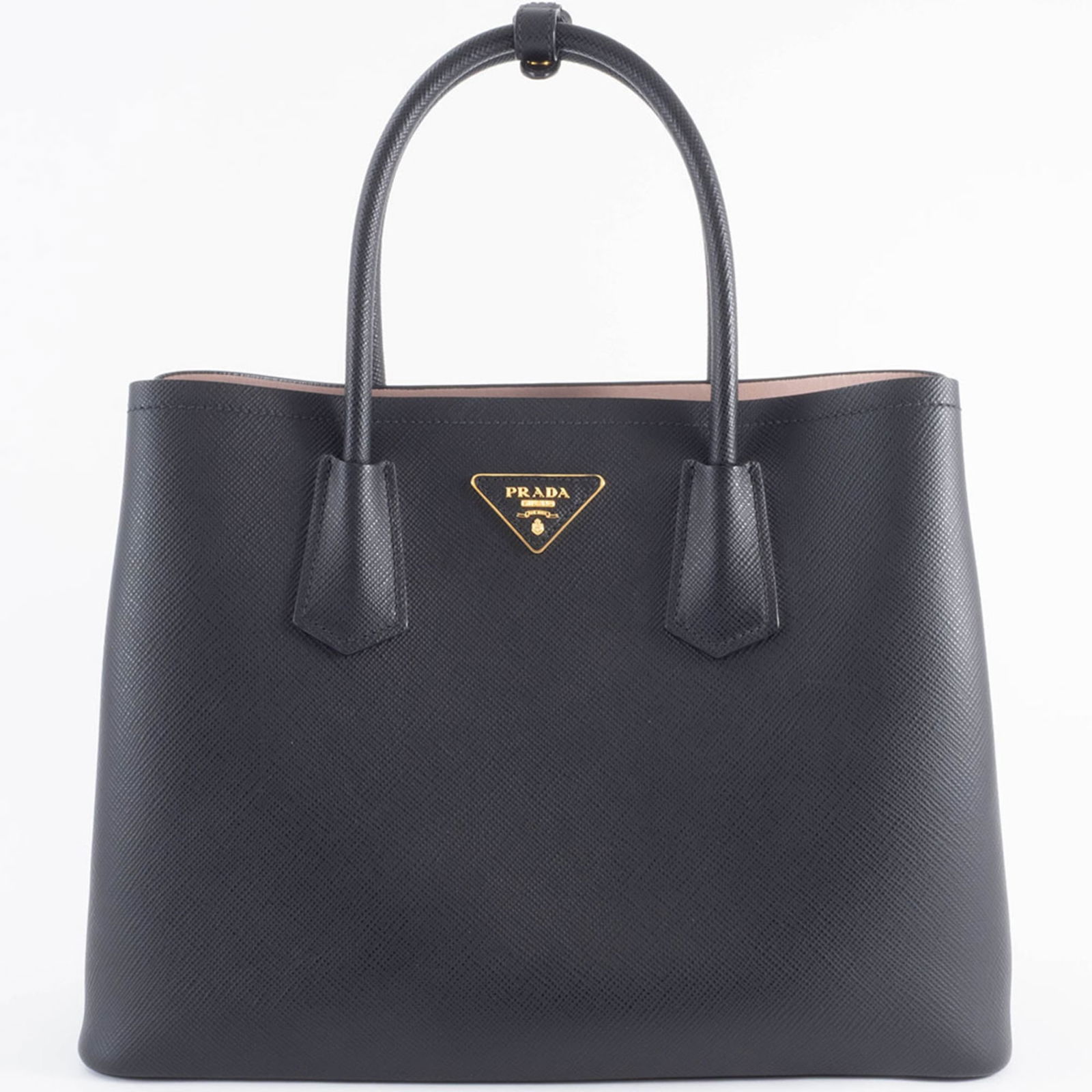 Leather Prada Handbag: Leather Prada Handbag This listing features Leather Prada Handbag. Item specifics are provided below. Item Specifics: Brand: Prada Type: Handbag Material: Leather Color: Black Gender: Women Size (Hxwx