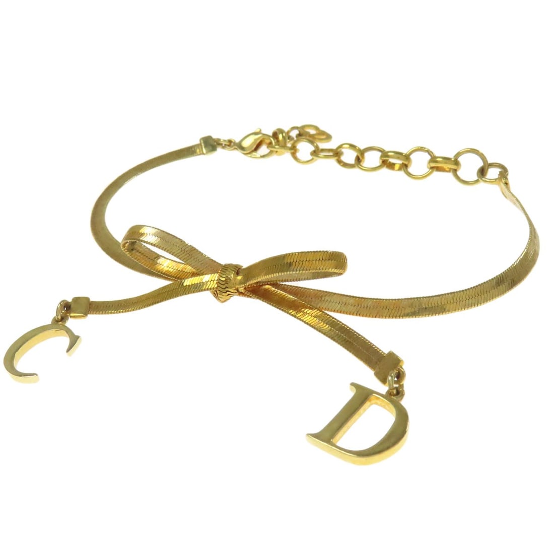Metal CHRISTIAN DIOR ribbon Bracelet: Metal CHRISTIAN DIOR ribbon Bracelet This listing features Metal CHRISTIAN DIOR ribbon Bracelet. Item specifics are provided below. Item Specifics: Brand: CHRISTIAN DIOR Style: Bracelet Material:
