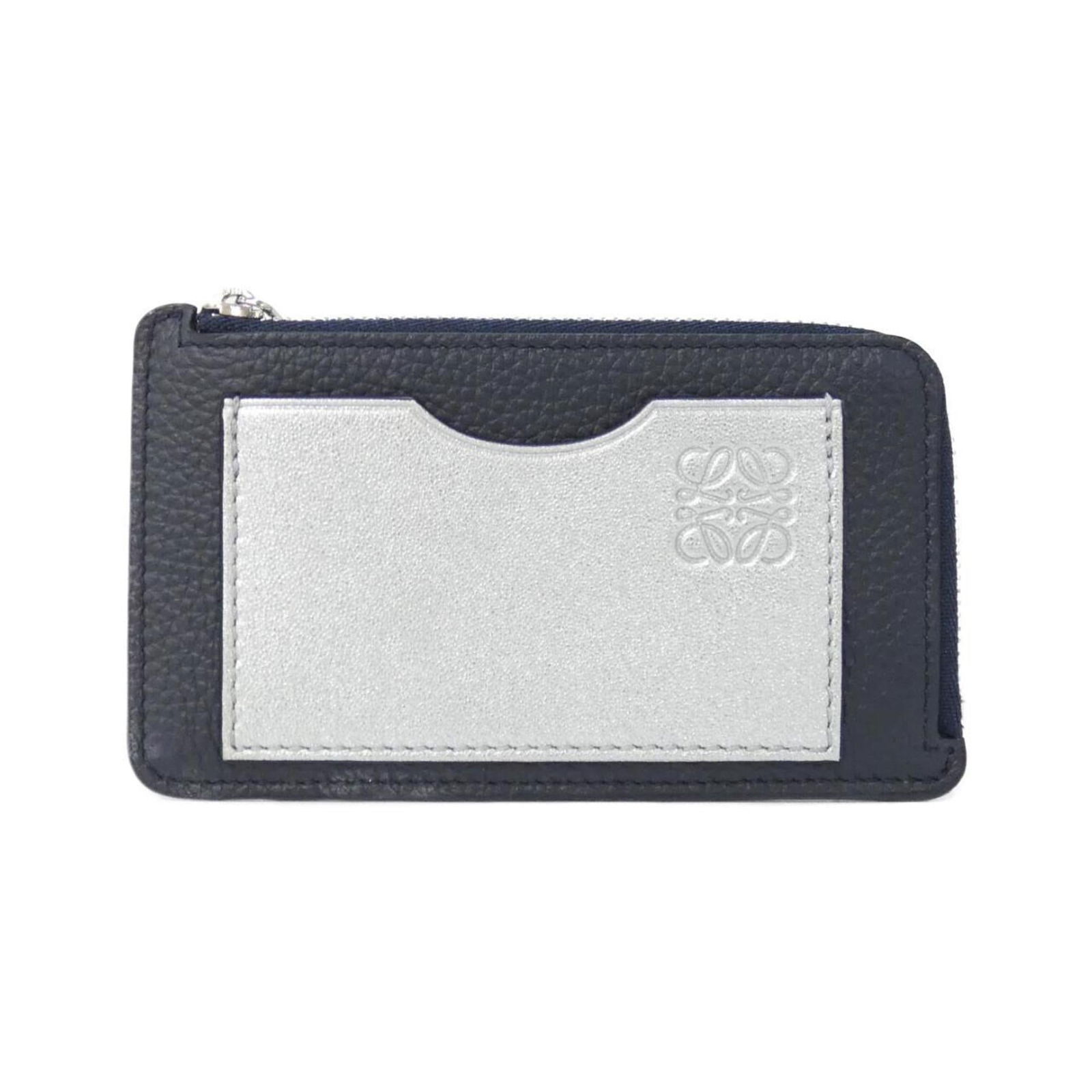Case Loewe Card: Case Loewe Card This listing features Case Loewe Card. Item specifics are provided below. Item Specifics: Brand: Loewe Type: Card Case Gender: Men,Women Color: Dark Navy, Silver Condition: Used (very