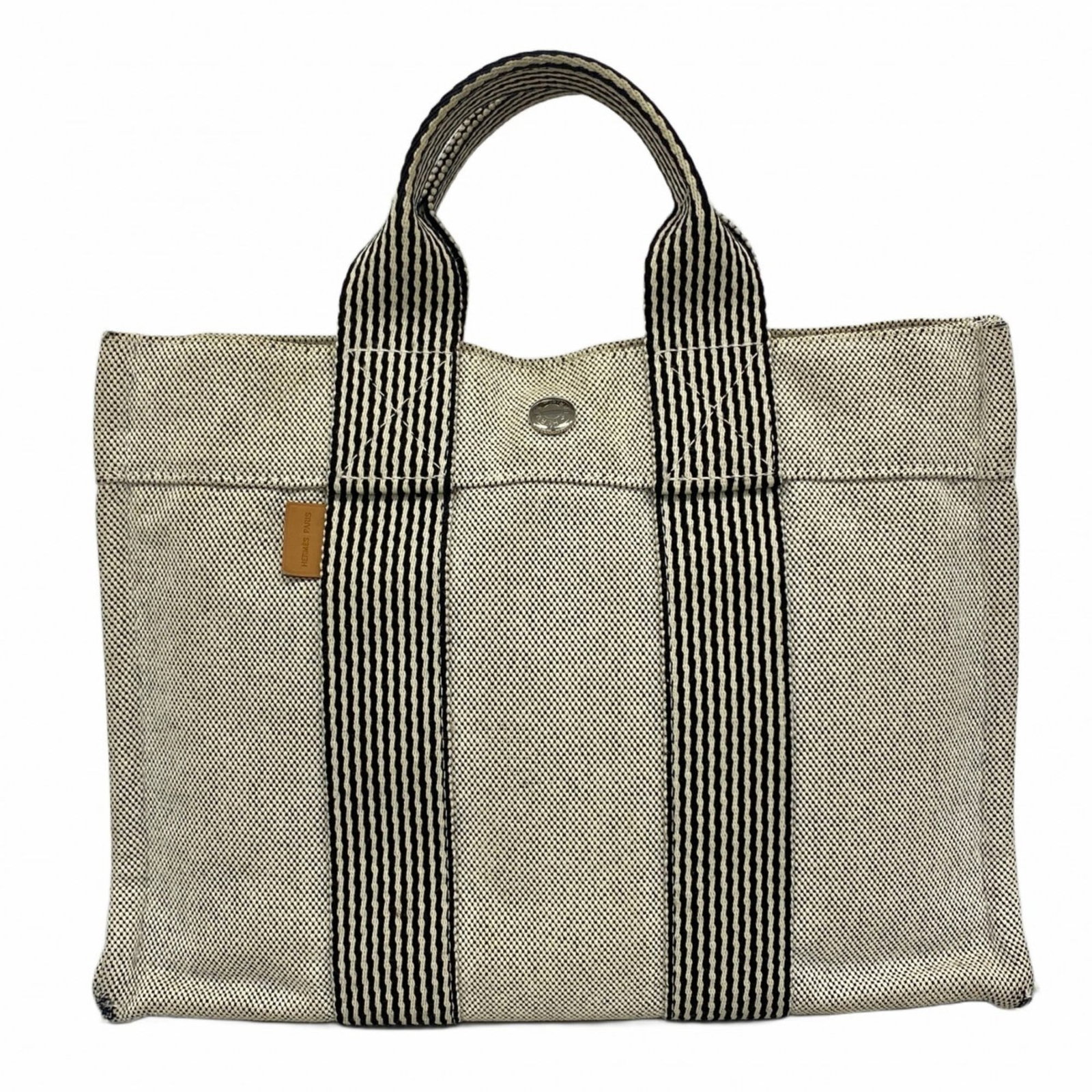 Canvas Hermes Tote Bag: Canvas Hermes Tote Bag This listing features Canvas Hermes Tote Bag. Item specifics are provided below. Item Specifics: Brand: Hermes Type: Tote Bag Material: Canvas Color: Black, Gray Hardware Color: