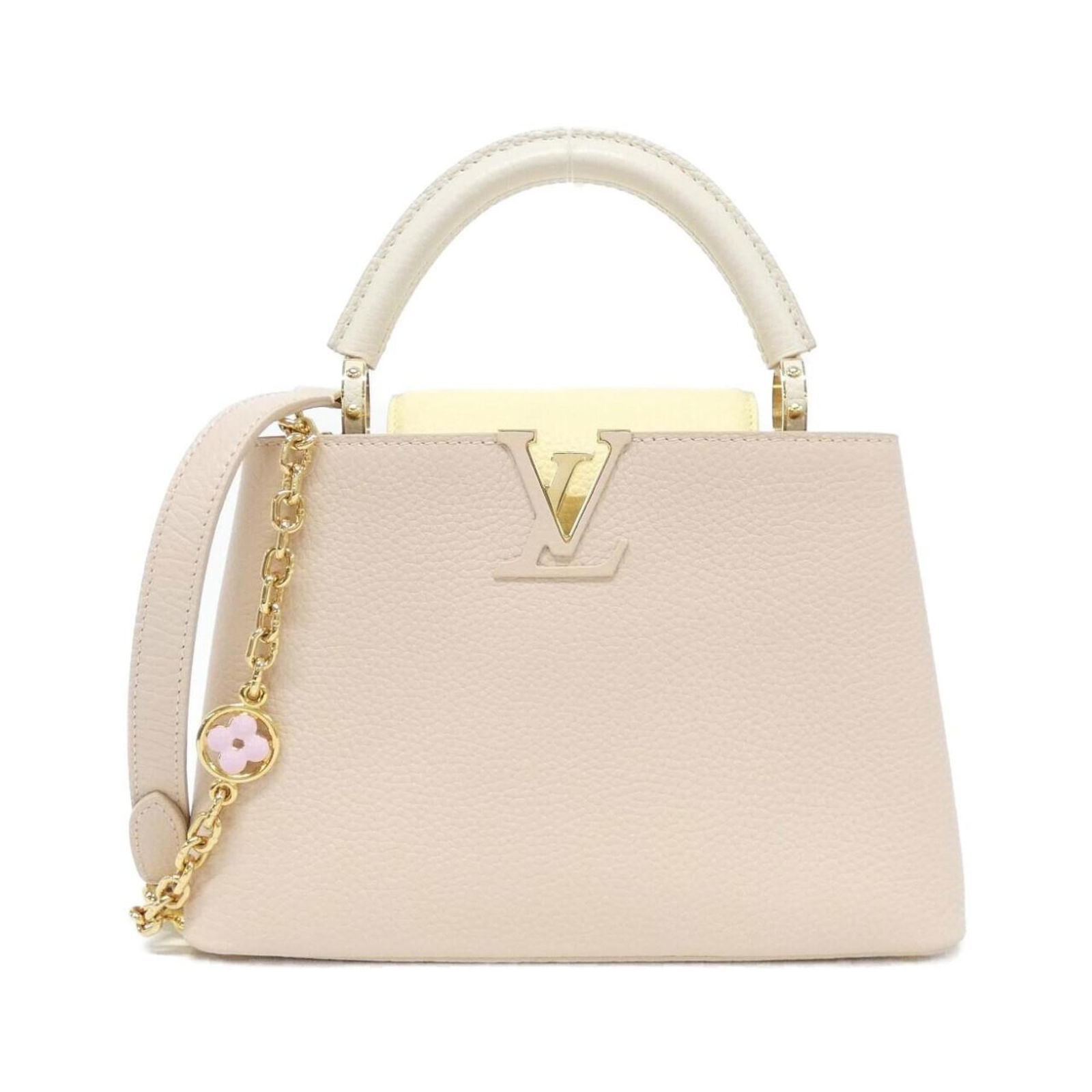 Handbag Louis Vuitton: Handbag Louis Vuitton This listing features Handbag Louis Vuitton. Item specifics are provided below. Item Specifics: Brand: Louis Vuitton Type: Handbag Color: Beige Poodle Hardware Color: Gold