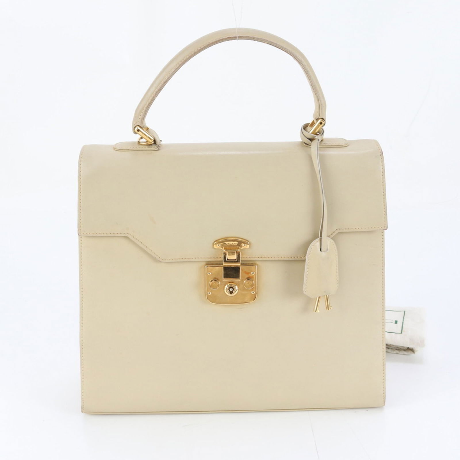 Leather Gucci Handbag: Leather Gucci Handbag This listing features Leather Gucci Handbag. Item specifics are provided below. Item Specifics: Brand: Gucci Type: Handbag Material: Leather Color: Beige Gender: Women Size