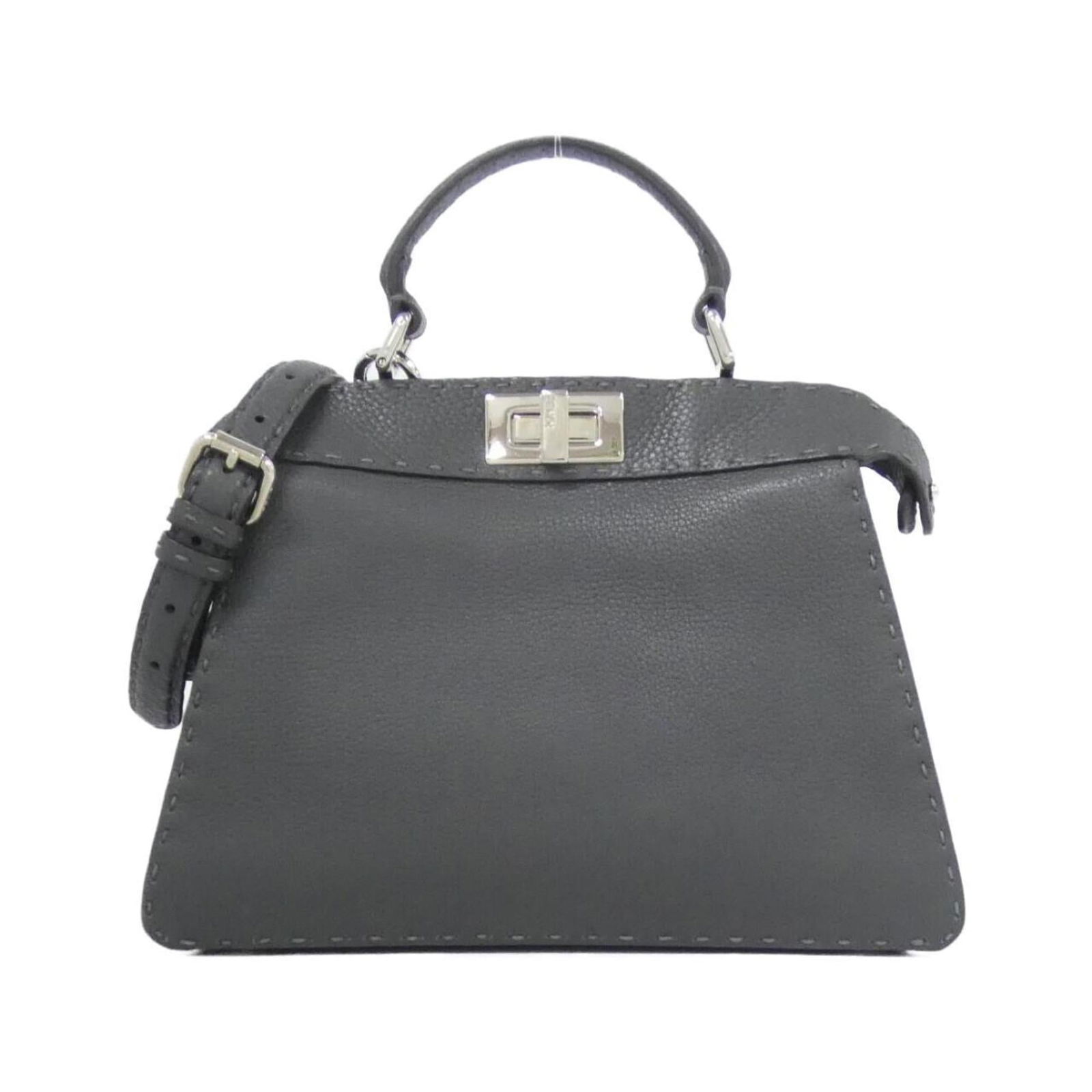 Leather Fendi Handbag: Leather Fendi Handbag This listing features Leather Fendi Handbag. Item specifics are provided below. Item Specifics: Brand: Fendi Type: Handbag Material: Leather Leather/Fur Type: Calfskin Color: