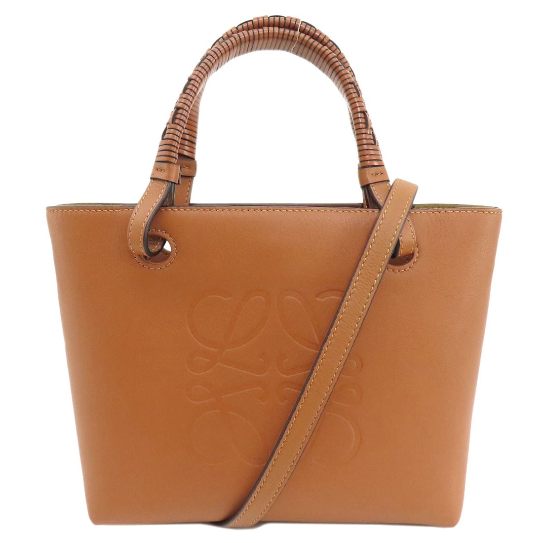 Calf LOEWE anagram Tote Bag: Calf LOEWE anagram Tote Bag This listing features Calf LOEWE anagram Tote Bag. Item specifics are provided below. Item Specifics: Brand: LOEWE Style: Tote Bag Exterior Material: Calf Color: Brown