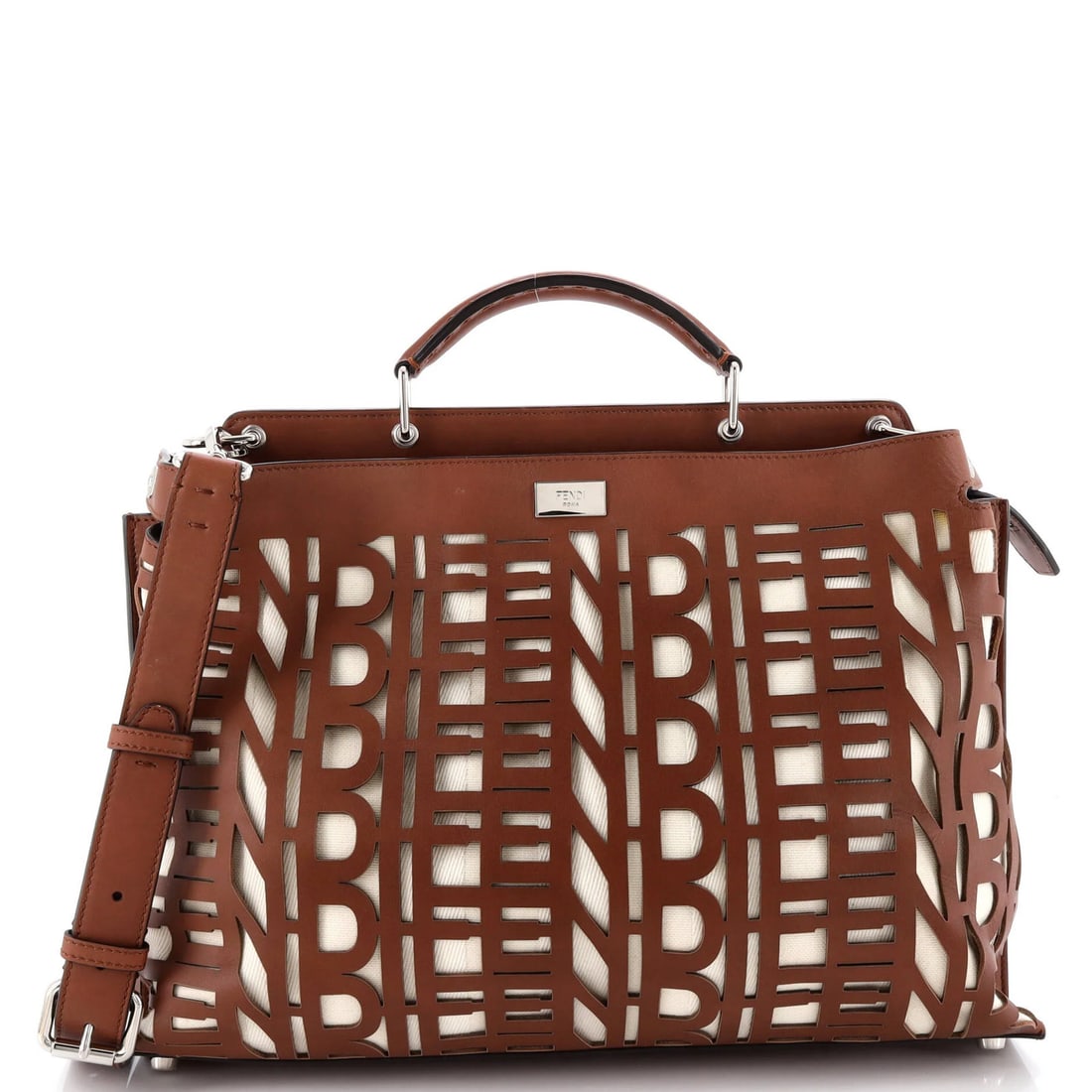 Large Fendi Peekaboo Iconic Essential Bag Laser Cut Leather and Canvas: Large Fendi Peekaboo Iconic Essential Bag Laser Cut Leather and Canvas This listing features Large Fendi Peekaboo Iconic Essential Bag Laser Cut Leather and Canvas. Item specifics are provided below.