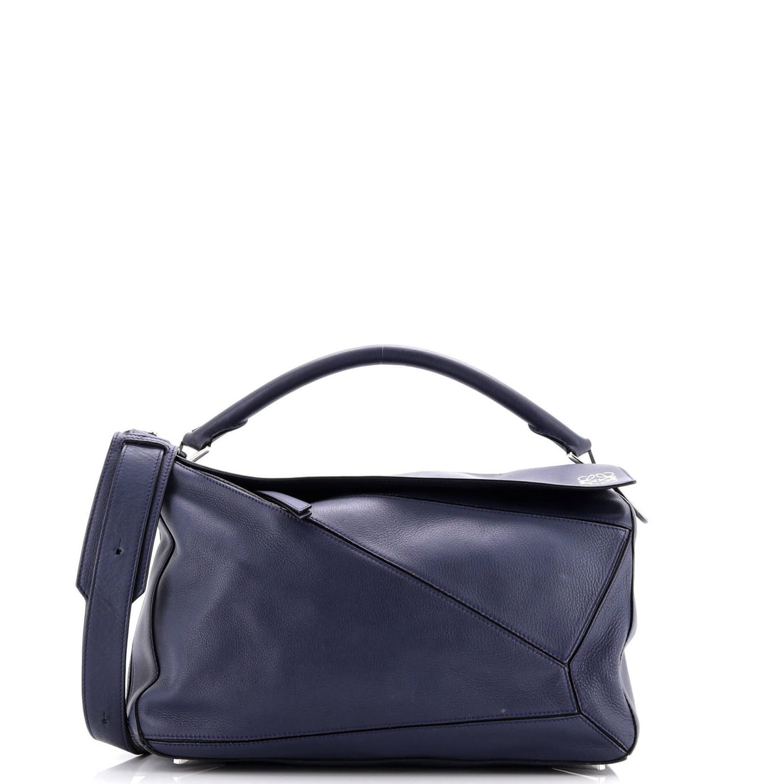 Large Loewe Puzzle Bag Leather: Large Loewe Puzzle Bag Leather This listing features Large Loewe Puzzle Bag Leather. Item specifics are provided below. Item Specifics: Brand: Loewe Exterior Material: Leather Style: Satchels Exterior