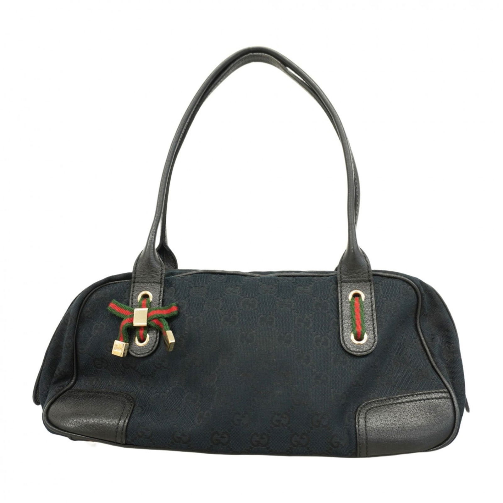 Canvas Gucci Handbag: Canvas Gucci Handbag This listing features Canvas Gucci Handbag. Item specifics are provided below. Item Specifics: Brand: Gucci Type: Handbag Material: Canvas Color: Black Hardware Color: Champagne
