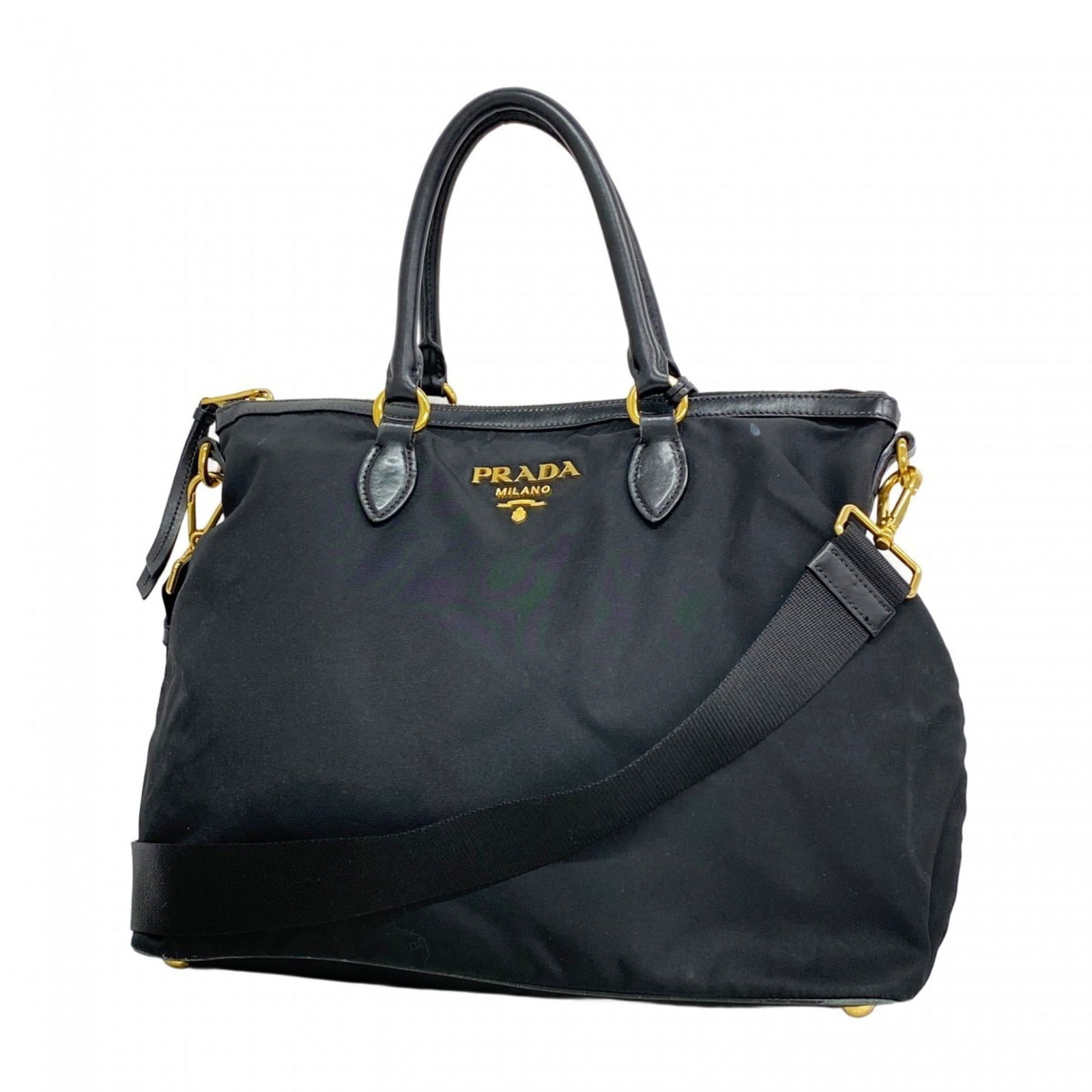 Nylon Prada Handbag: Nylon Prada Handbag This listing features Nylon Prada Handbag. Item specifics are provided below. Item Specifics: Brand: Prada Type: Handbag Material: Nylon Color: Black Hardware Color: Gold Gender: W