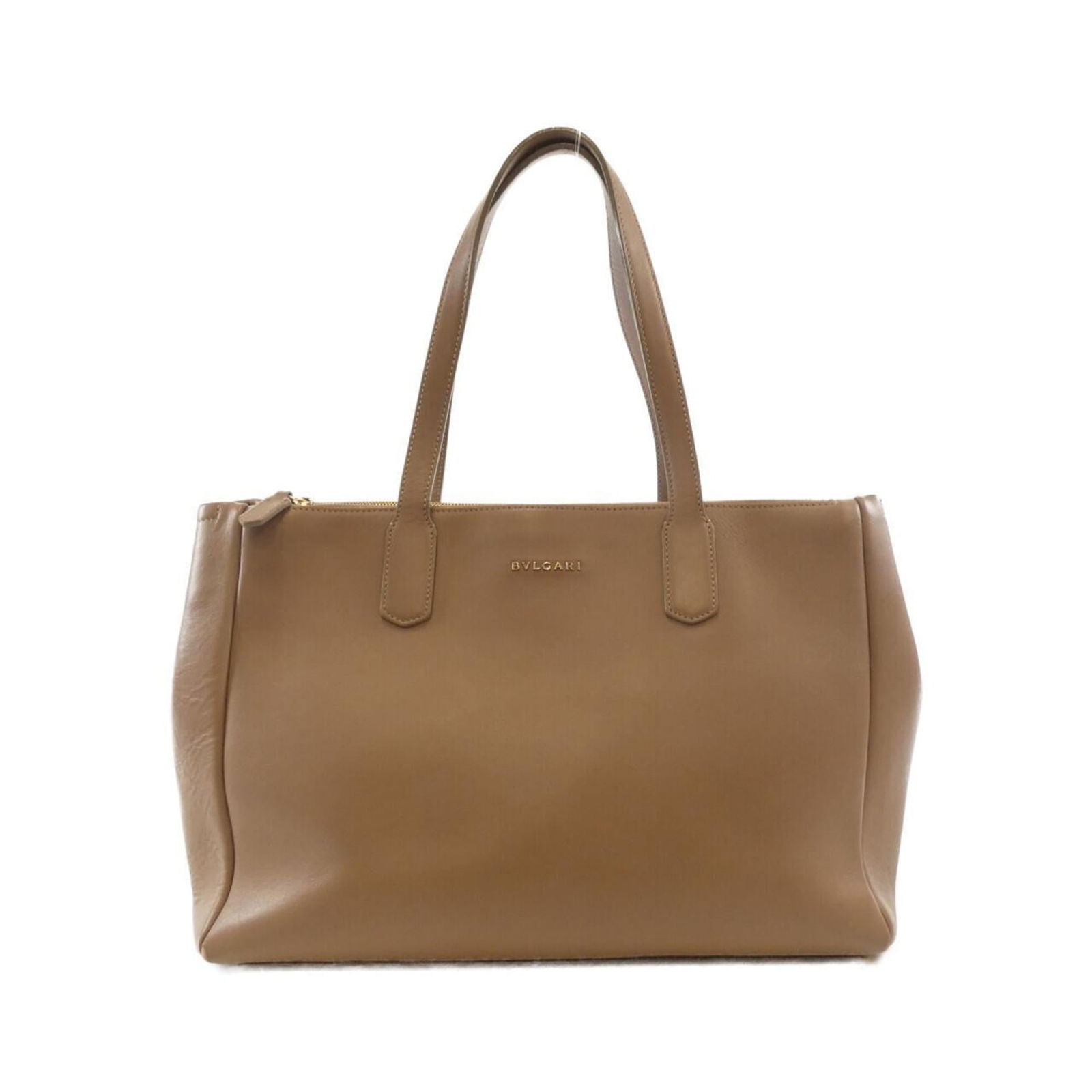 Leather Bvlgari Handbag: Leather Bvlgari Handbag This listing features Leather Bvlgari Handbag. Item specifics are provided below. Item Specifics: Brand: Bvlgari Type: Handbag Material: Leather Color: Beige, Beige Brown