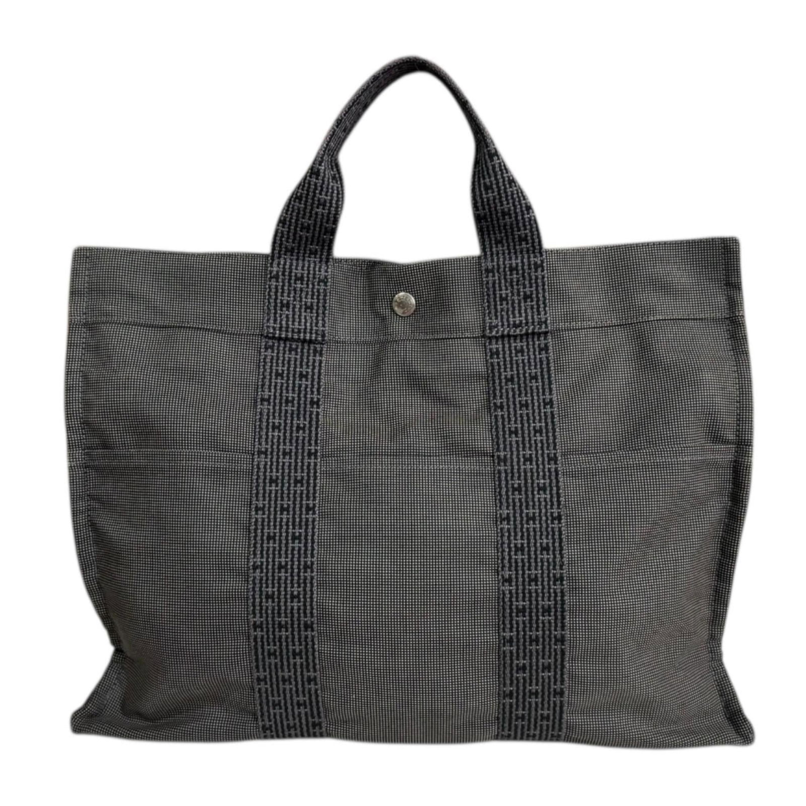 Canvas Hermes Tote Bag: Canvas Hermes Tote Bag This listing features Canvas Hermes Tote Bag. Item specifics are provided below. Item Specifics: Brand: Hermes Type: Tote Bag Material: Canvas Color: Gray Gender: Women Size (Hx
