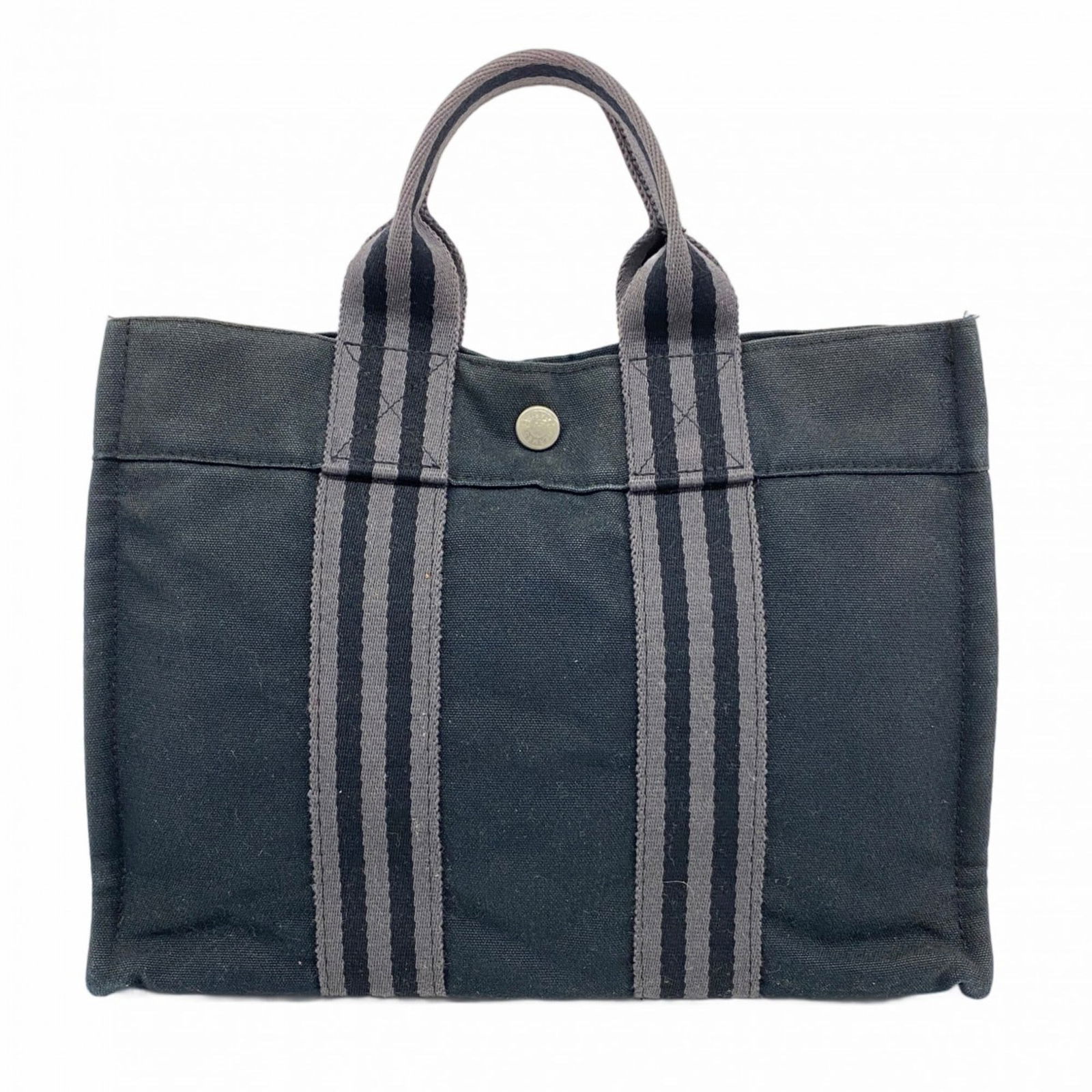 Canvas Hermes Tote Bag: Canvas Hermes Tote Bag This listing features Canvas Hermes Tote Bag. Item specifics are provided below. Item Specifics: Brand: Hermes Type: Tote Bag Material: Canvas Color: Black Hardware Color: Silve