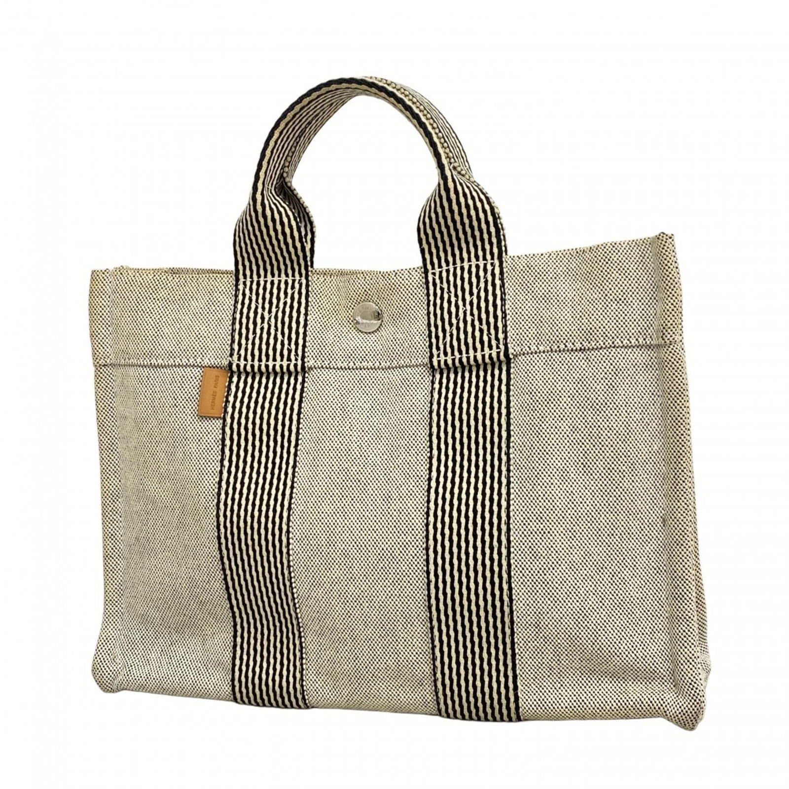 Canvas Hermes Tote Bag: Canvas Hermes Tote Bag This listing features Canvas Hermes Tote Bag. Item specifics are provided below. Item Specifics: Brand: Hermes Type: Tote Bag Material: Canvas Color: Black, Gray Hardware Color: