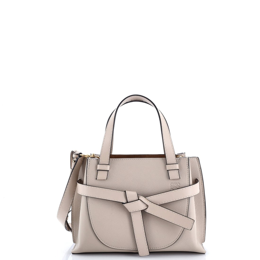 Mini Loewe Gate Tote Leather: Mini Loewe Gate Tote Leather This listing features Mini Loewe Gate Tote Leather. Item specifics are provided below. Item Specifics: Brand: Loewe Exterior Material: Leather Style: Top Handle Exterior C