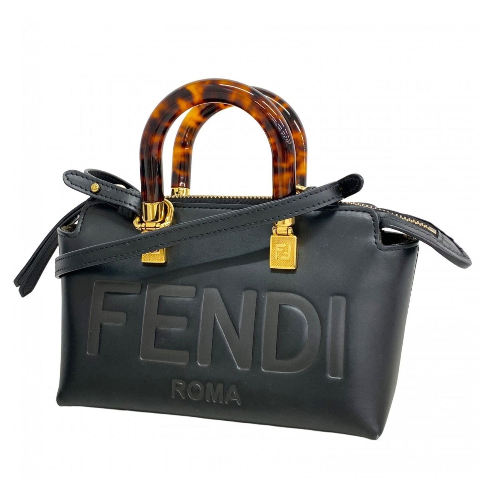Leather Fendi Handbag: Leather Fendi Handbag This listing features Leather Fendi Handbag. Item specifics are provided below. Item Specifics: Brand: Fendi Type: Handbag Material: Leather Color: Black, Brown Hardware Color: G