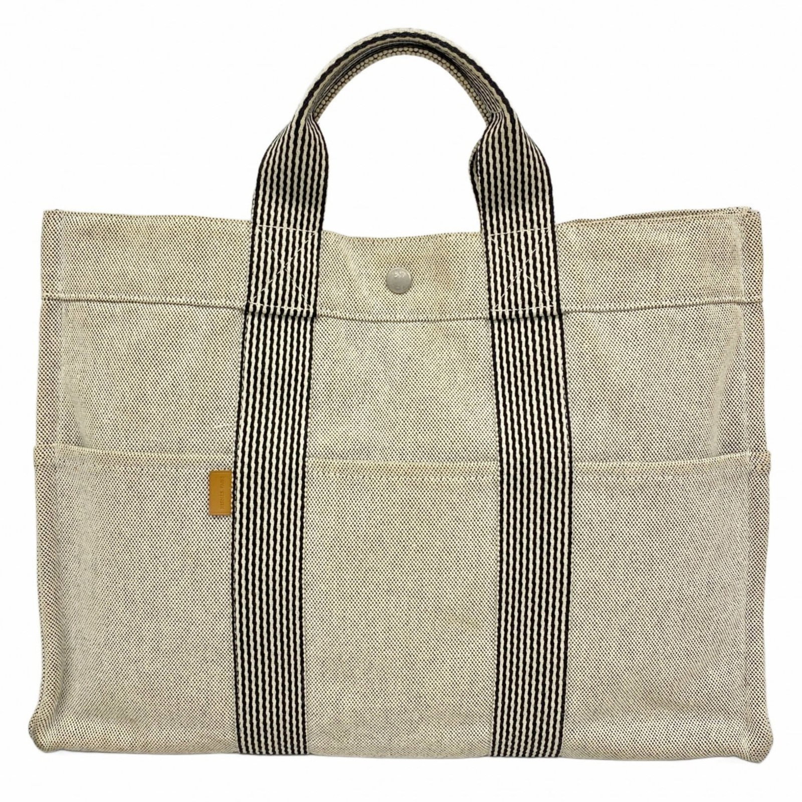 Canvas Hermes Tote Bag: Canvas Hermes Tote Bag This listing features Canvas Hermes Tote Bag. Item specifics are provided below. Item Specifics: Brand: Hermes Type: Tote Bag Material: Canvas Color: Gray Hardware Color:
