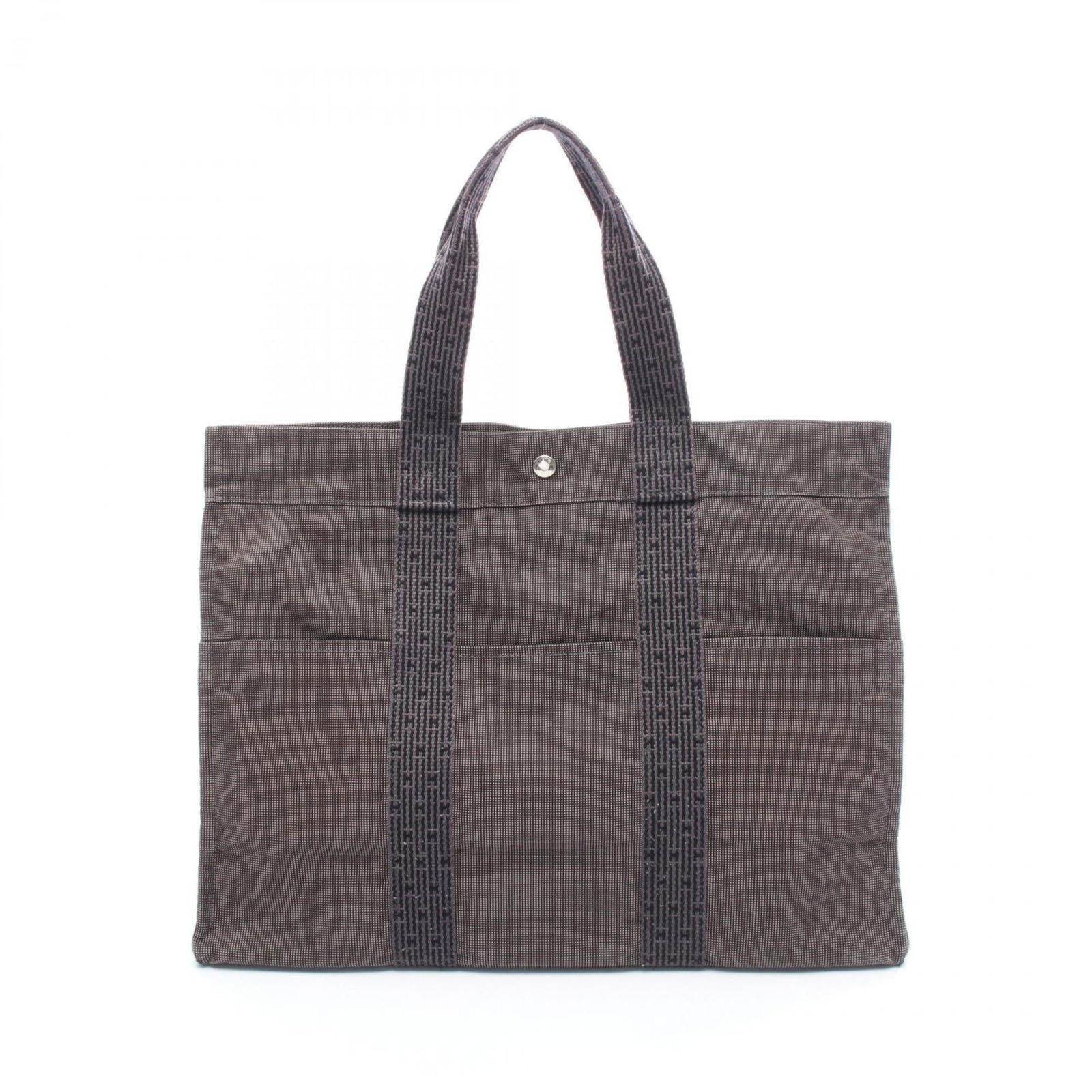 Canvas Hermes Tote Bag Nylon: Canvas Hermes Tote Bag Nylon This listing features Canvas Hermes Tote Bag Nylon. Item specifics are provided below. Item Specifics: Brand: Hermes Type: Tote Bag Material: Nylon Canvas Color: Gray Gend