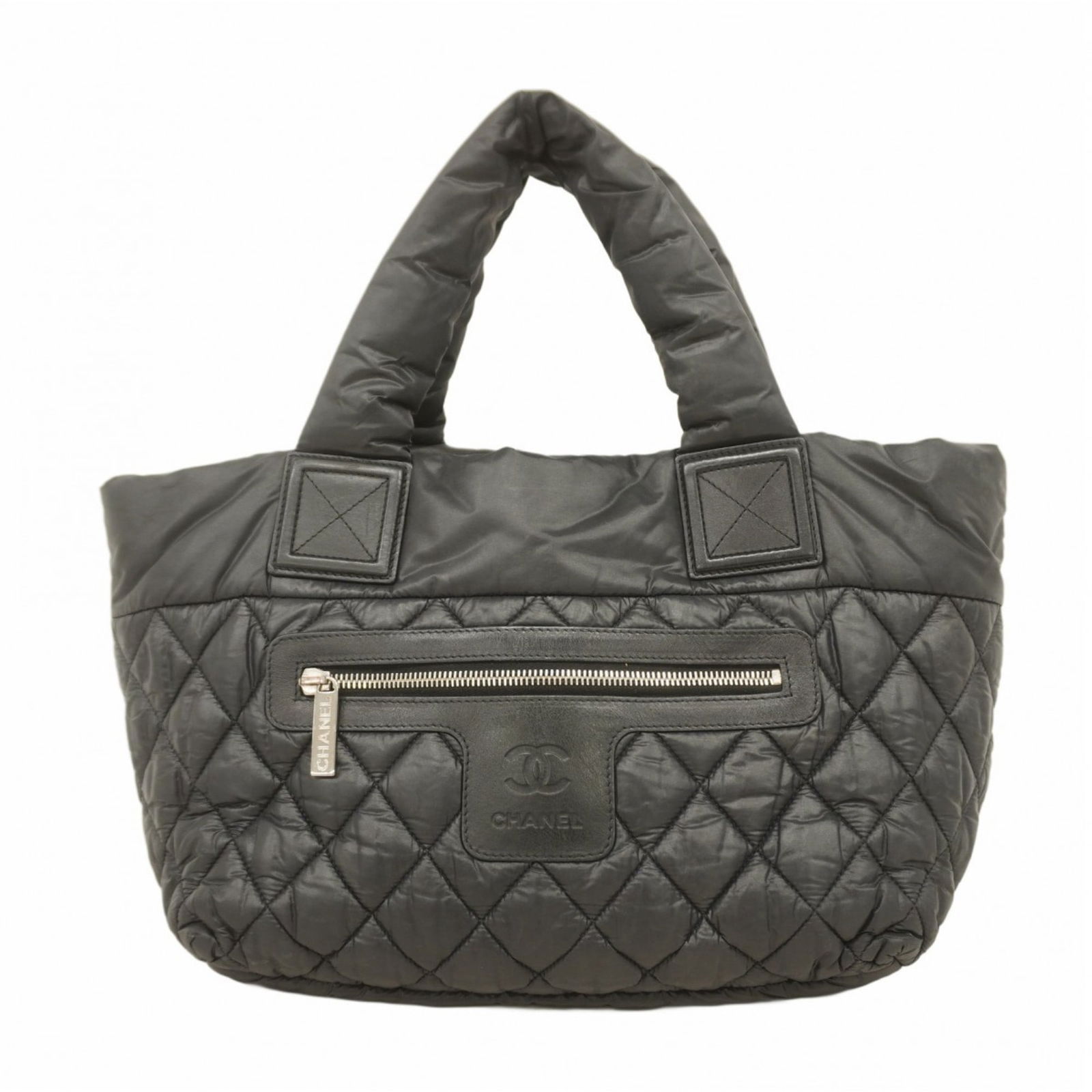 Nylon Chanel Tote Bag: Nylon Chanel Tote Bag This listing features Nylon Chanel Tote Bag. Item specifics are provided below. Item Specifics: Brand: Chanel Type: Tote Bag Material: Nylon Color: Black Hardware Color: Silver