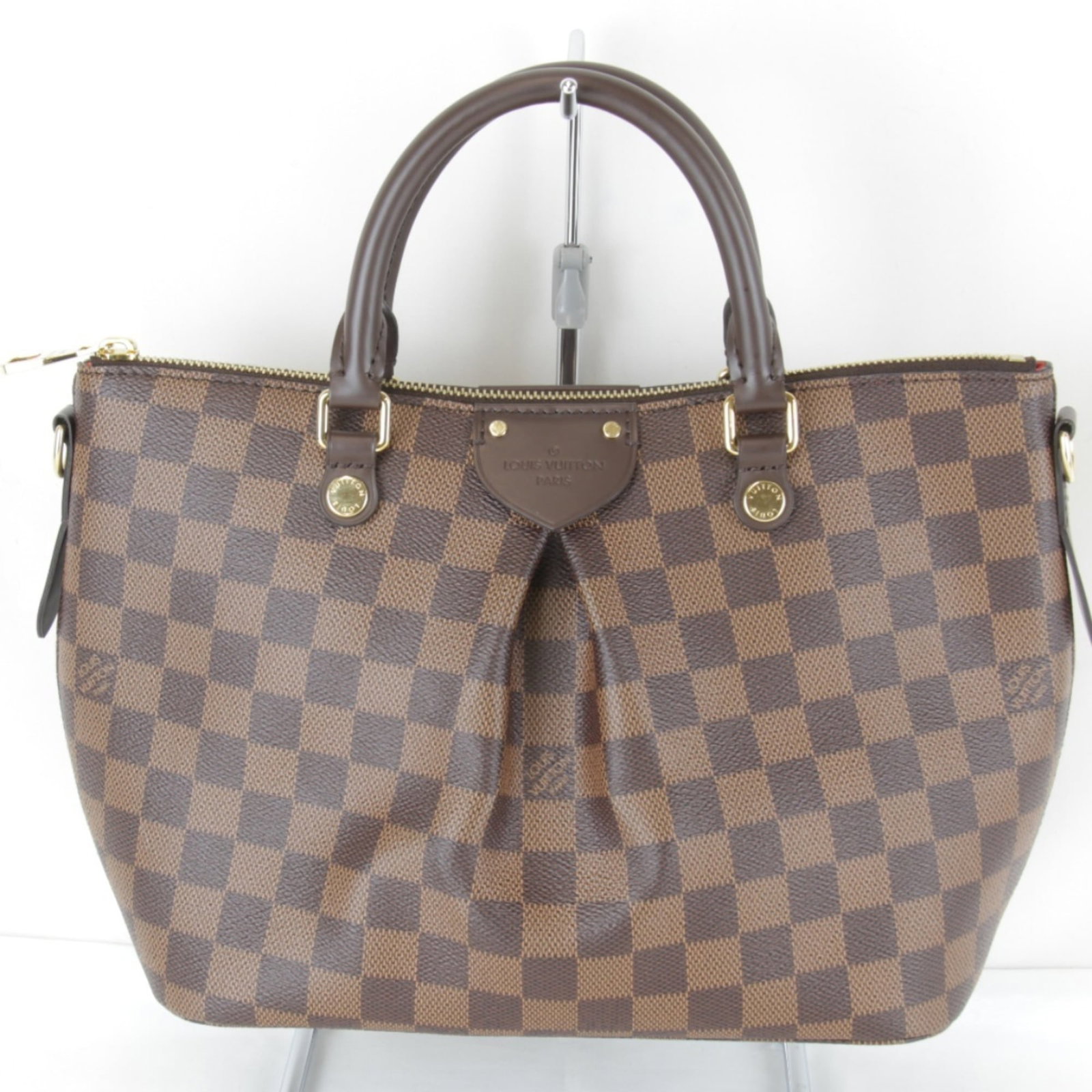 Canvas Louis Vuitton Handbag Damier: Canvas Louis Vuitton Handbag Damier This listing features Canvas Louis Vuitton Handbag Damier. Item specifics are provided below. Item Specifics: Brand: Louis Vuitton Type: Handbag Material: Damier Ca