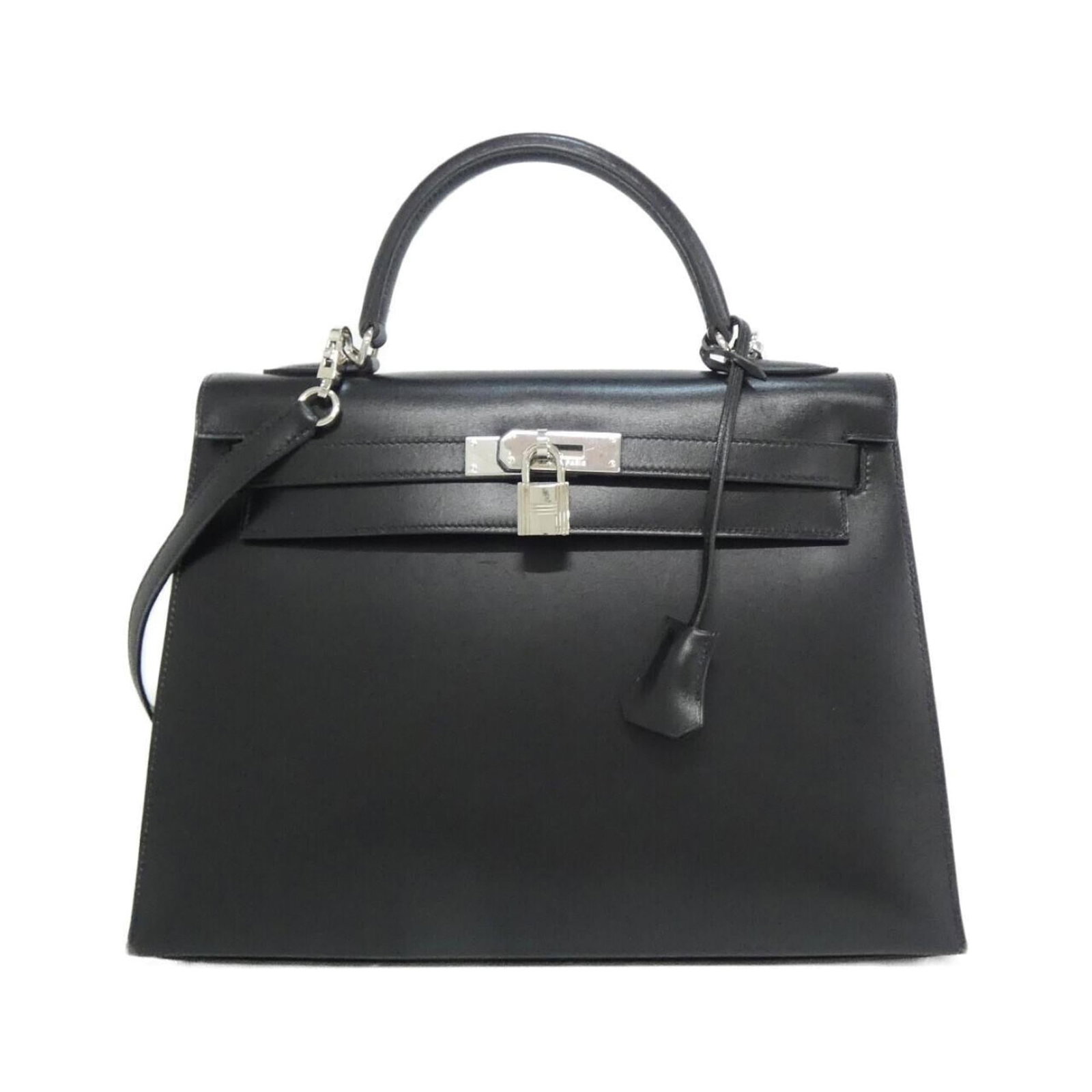 Leather Hermes Handbag: Leather Hermes Handbag This listing features Leather Hermes Handbag. Item specifics are provided below. Item Specifics: Brand: Hermes Type: Handbag Material: Leather Color: Black Gender: Women,Men