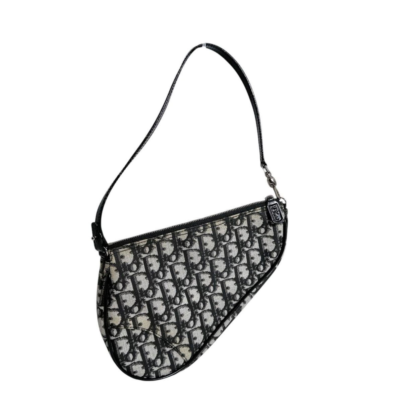 Pouch Pvc - Christian Dior Handbag: Pouch Pvc - Christian Dior Handbag This listing features Pouch Pvc - Christian Dior Handbag. Item specifics are provided below. Item Specifics: Brand: Christian Dior Type: Handbag, Pouch Material: