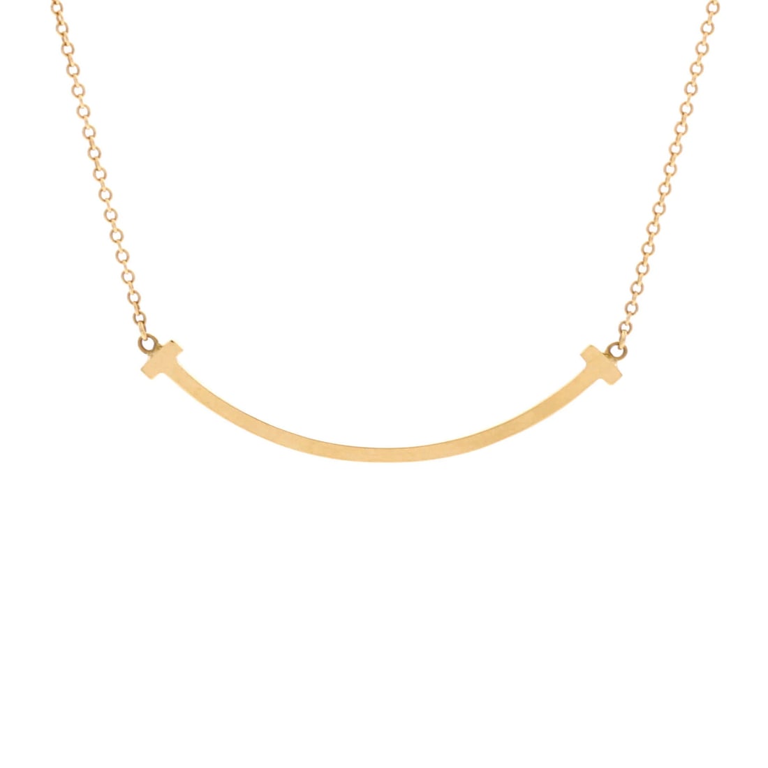 Small Tiffany & Co. T Smile Pendant Necklace 18K Yellow Gold: Small Tiffany & Co. T Smile Pendant Necklace 18K Yellow Gold This listing features Small Tiffany & Co. T Smile Pendant Necklace 18K Yellow Gold. Item specifics are provided below. Item Specifics: Styl