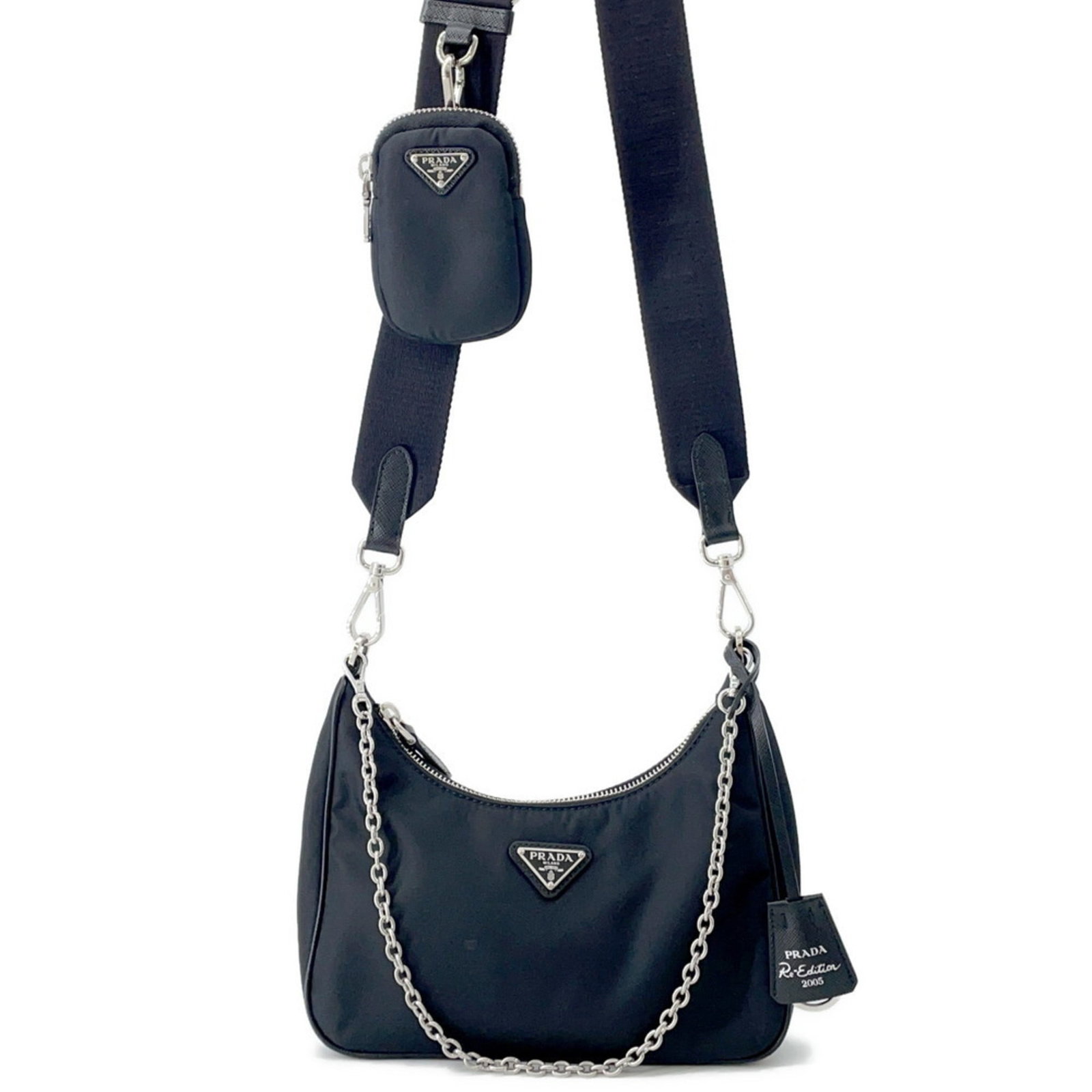Nylon Prada Shoulder Bag: Nylon Prada Shoulder Bag This listing features Nylon Prada Shoulder Bag. Item specifics are provided below. Item Specifics: Brand: Prada Type: Shoulder Bag Material: Nylon Color: Black Hardware