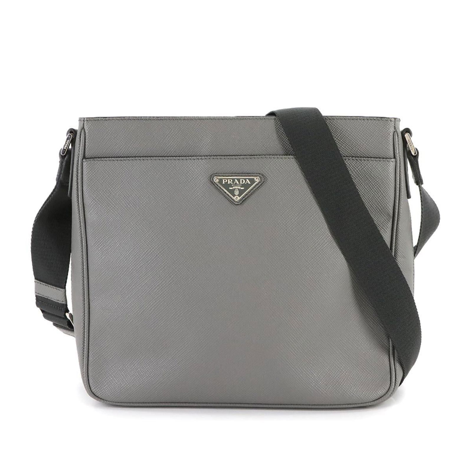Triangle Prada Shoulder Bag Saffiano: Triangle Prada Shoulder Bag Saffiano This listing features Triangle Prada Shoulder Bag Saffiano. Item specifics are provided below. Item Specifics: Brand: Prada Type: Shoulder Bag Material: Saffiano