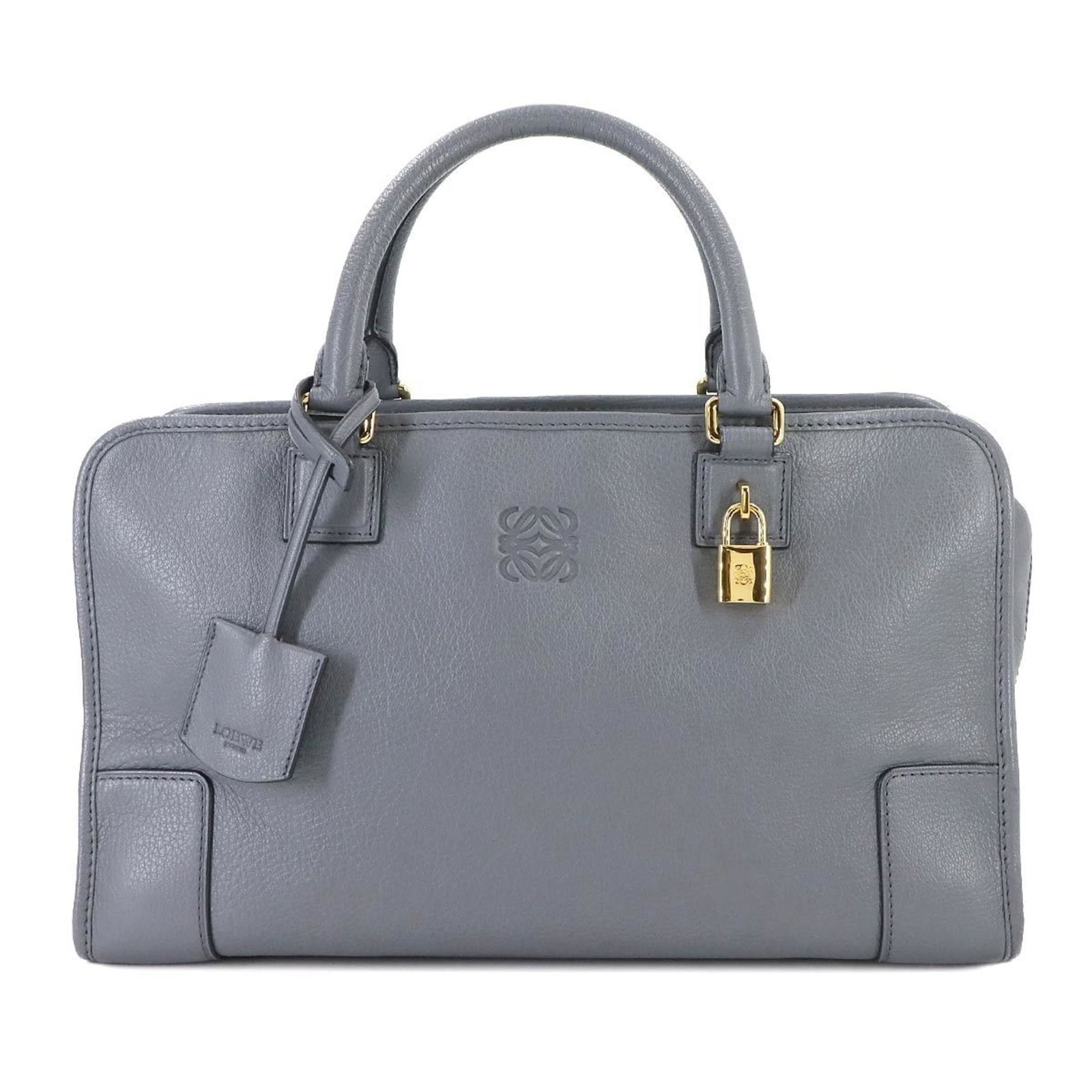 Leather Loewe Handbag: Leather Loewe Handbag This listing features Leather Loewe Handbag. Item specifics are provided below. Item Specifics: Brand: Loewe Type: Handbag Material: Leather Color: Gray Gender: Women Size