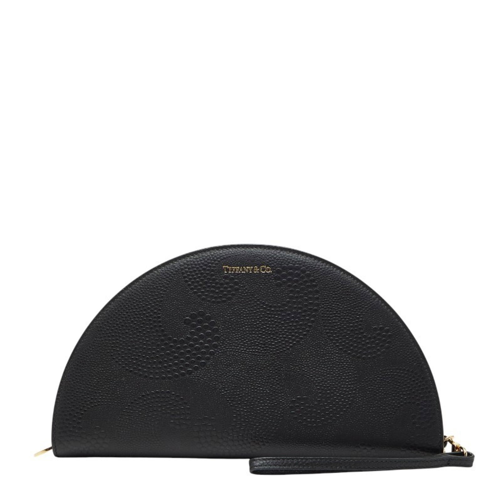 Leather Tiffany Long Wallet (Bi-Fold): Leather Tiffany Long Wallet (Bi-Fold) This listing features Leather Tiffany Long Wallet (Bi-Fold). Item specifics are provided below. Item Specifics: Brand: Tiffany Type: Long Wallet (Bi-Fold) Gender: