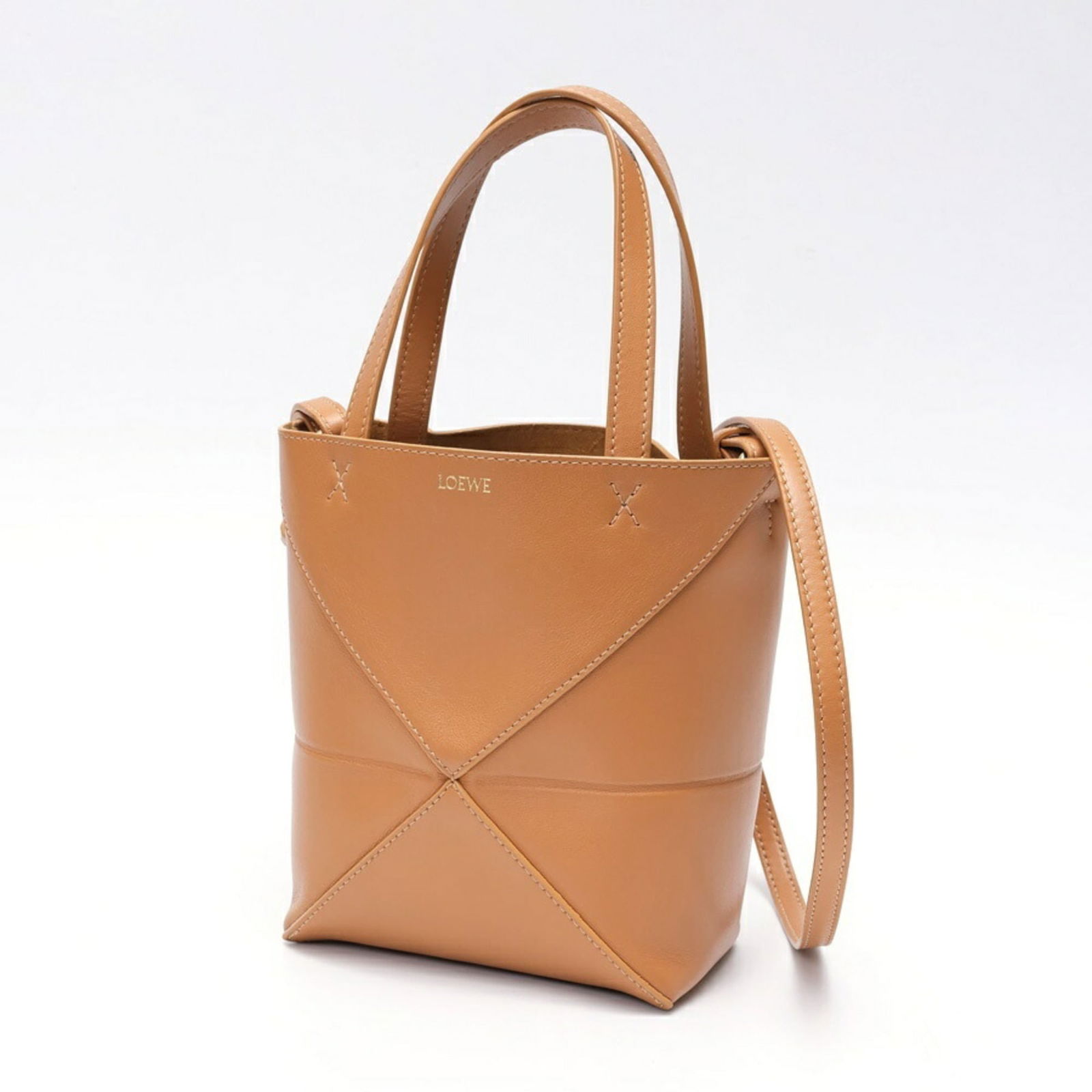 Leather Loewe Shoulder Bag: Leather Loewe Shoulder Bag This listing features Leather Loewe Shoulder Bag. Item specifics are provided below. Item Specifics: Brand: Loewe Type: Shoulder Bag Material: Leather Color: Brown Gender: