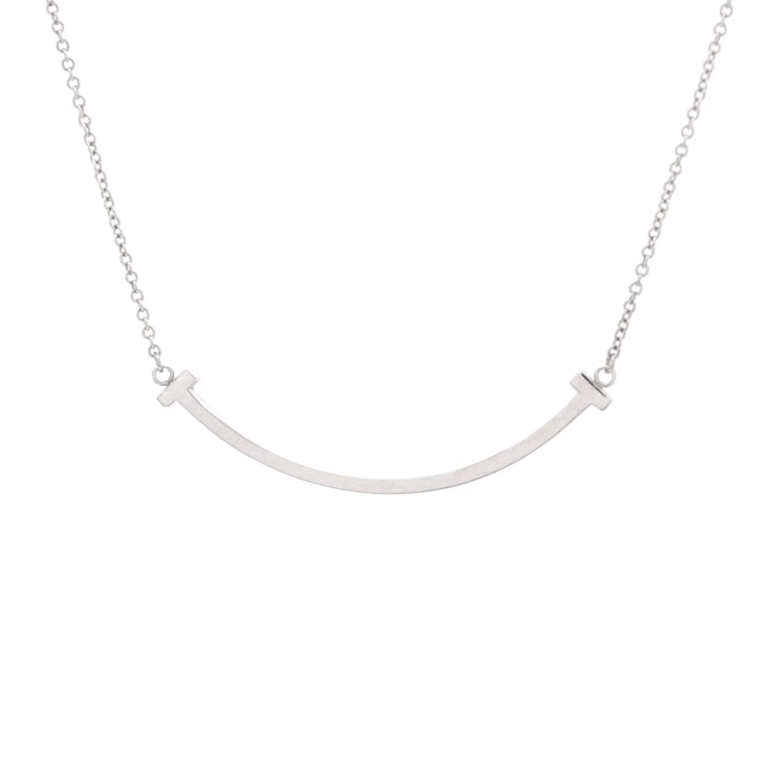 Small Tiffany & Co. T Smile Pendant Necklace 18K White Gold: Small Tiffany & Co. T Smile Pendant Necklace 18K White Gold This listing features Small Tiffany & Co. T Smile Pendant Necklace 18K White Gold. Item specifics are provided below. Item Specifics: