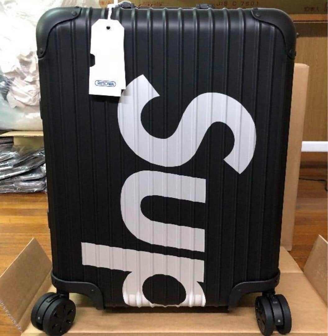 Black Supreme x RIMOWA Topas Multiwheel 45L: Black Supreme x RIMOWA Topas Multiwheel 45L This listing features Black Supreme x RIMOWA Topas Multiwheel 45L. Item specifics are provided below. Item Specifics: Brand: RIMOWA Color: Red Features: Whe