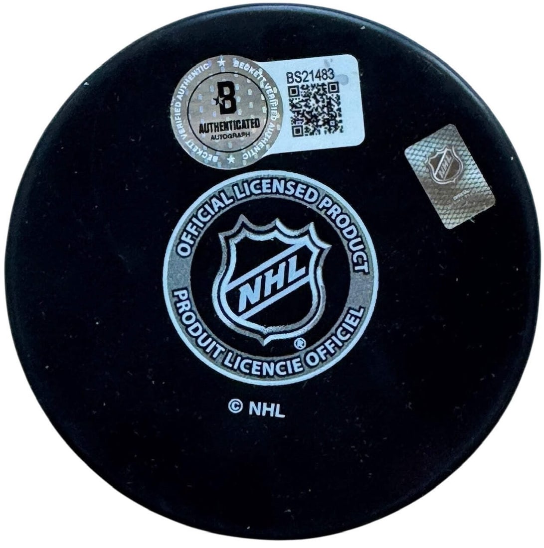 (Beckett) Paul Maurice Autographed Panthers Official Puck - 2