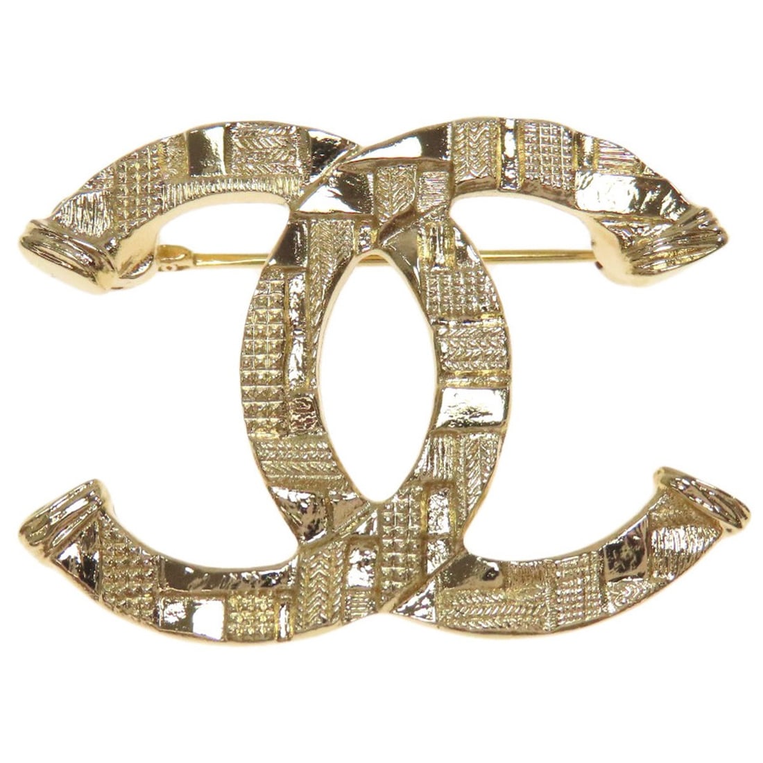 Metal CHANEL Tweed pattern COCO Mark Brooch: Metal CHANEL Tweed pattern COCO Mark Brooch This listing features Metal CHANEL Tweed pattern COCO Mark Brooch. Item specifics are provided below. Item Specifics: Brand: CHANEL Style: Brooch Material: