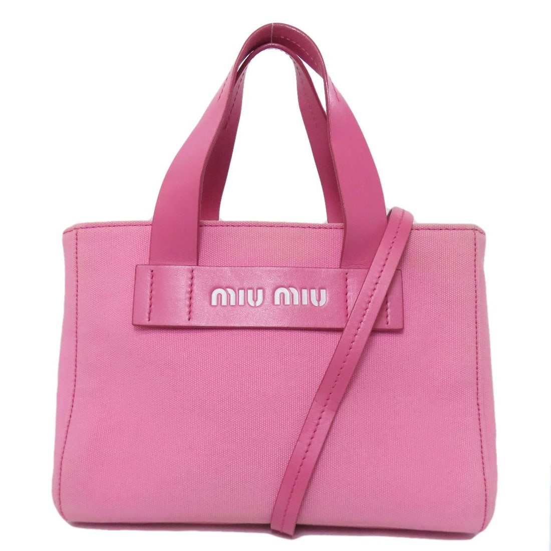 Canvas MIUMIU 5BA176 2WAY Handbag: Canvas MIUMIU 5BA176 2WAY Handbag This listing features Canvas MIUMIU 5BA176 2WAY Handbag. Item specifics are provided below. Item Specifics: Brand: MIUMIU Style: Handbag Exterior Material: Canvas Ext