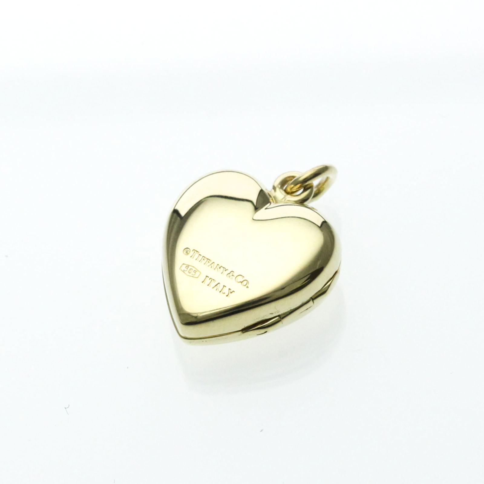 Women Fashion Locket (Gold) - Tiffany Locket Pendant Heart Top Yellow Gold (14K) No Stone Men: Women Fashion Locket (Gold) - Tiffany Locket Pendant Heart Top Yellow Gold (14K) No Stone Men This listing features Women Fashion Locket (Gold) - Tiffany Locket Pendant Heart Top Yellow Gold (14K) No