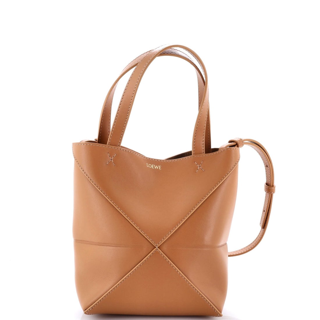 Mini Loewe Puzzle Fold Tote Leather: Mini Loewe Puzzle Fold Tote Leather This listing features Mini Loewe Puzzle Fold Tote Leather. Item specifics are provided below. Item Specifics: Brand: Loewe Exterior Material: Leather Style: Totes E