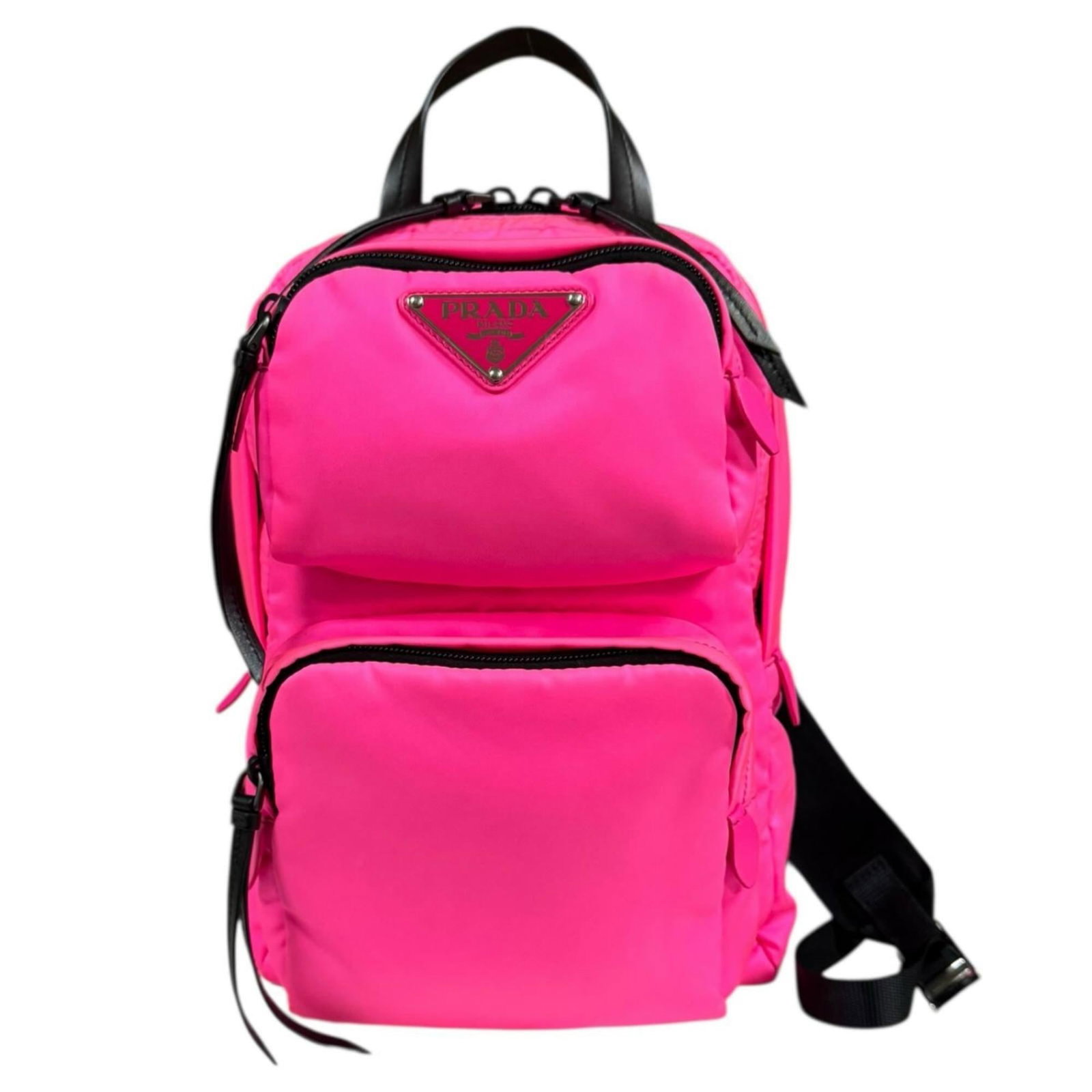 Nylon Prada Sling Bag: Nylon Prada Sling Bag This listing features Nylon Prada Sling Bag. Item specifics are provided below. Item Specifics: Brand: Prada Type: Sling Bag Material: Nylon Color: Pink Closure: Zipper Gender: W