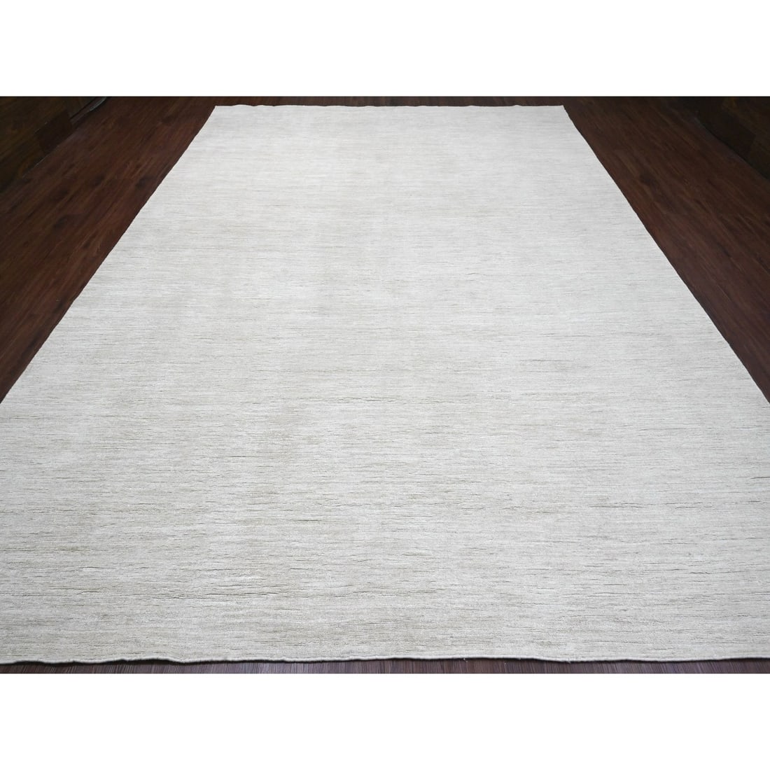 Rug 9'9"x13'6" Pearl White Plain Solid Pattern Hand Knotted Ghazni Wool: Rug 9'9"x13'6" Pearl White Plain Solid Pattern Hand Knotted Ghazni Wool This listing features Rug 9'9"x13'6" Pearl White Plain Solid Pattern Hand Knotted Ghazni Wool. Item specifics are provided below