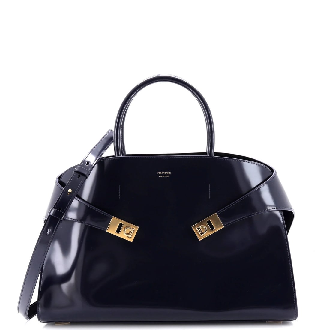 Large Salvatore Ferragamo Hug Top Handle Bag Leather: Large Salvatore Ferragamo Hug Top Handle Bag Leather This listing features Large Salvatore Ferragamo Hug Top Handle Bag Leather. Item specifics are provided below. Item Specifics: Brand: Salvatore Fer