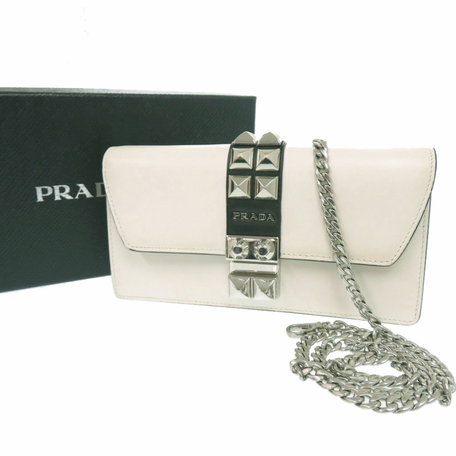 Leather Prada Chain/ Shoulder Wallet: Leather Prada Chain/ Shoulder Wallet This listing features Leather Prada Chain/ Shoulder Wallet. Item specifics are provided below. Item Specifics: Brand: Prada Type: Chain/Shoulder Wallet Gender: Wom