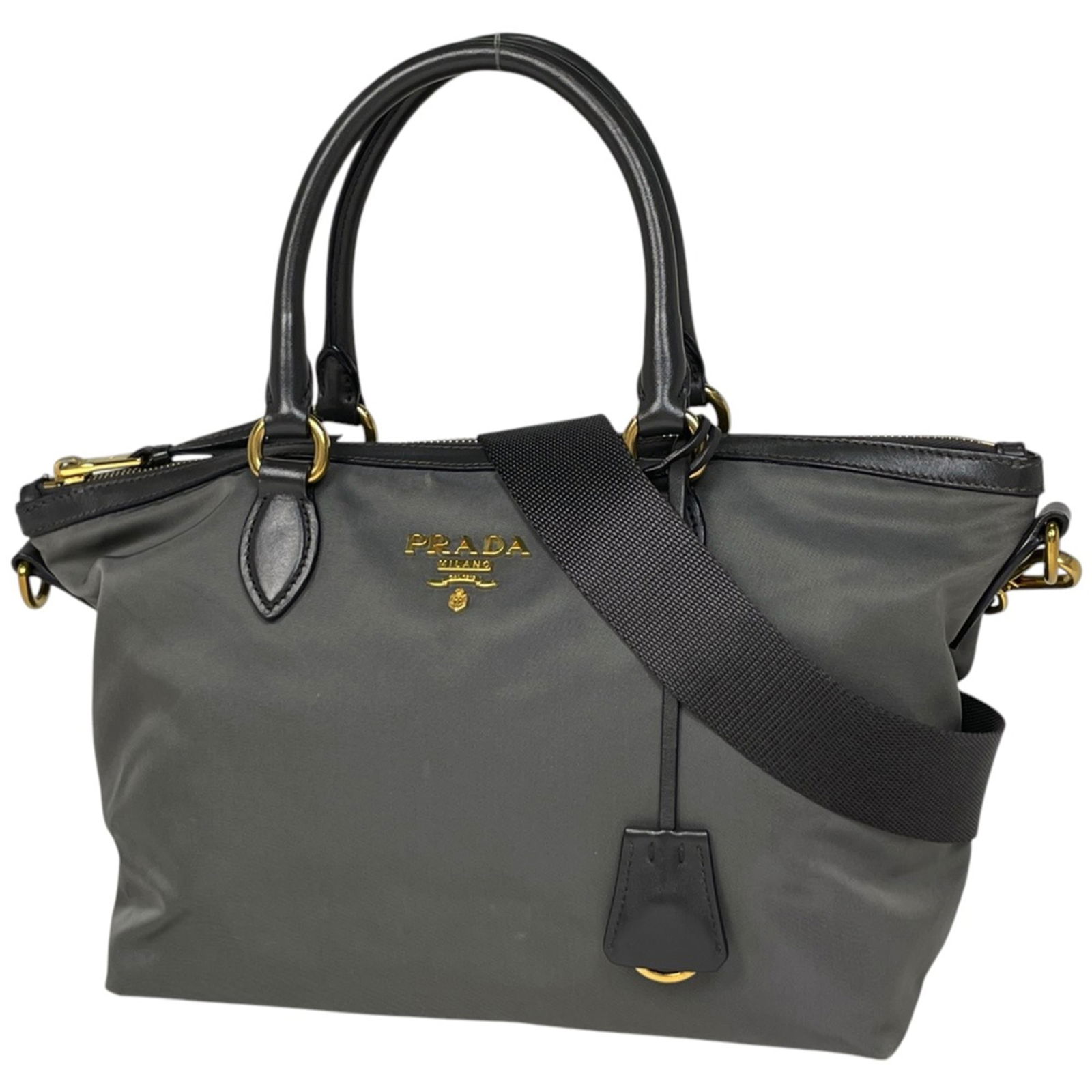 Leather - Prada Handbag - Shoulder Bag - Tote Bag Nylon: Leather - Prada Handbag - Shoulder Bag - Tote Bag Nylon This listing features Leather - Prada Handbag - Shoulder Bag - Tote Bag Nylon. Item specifics are provided below. Item Specifics: Brand: Prada T